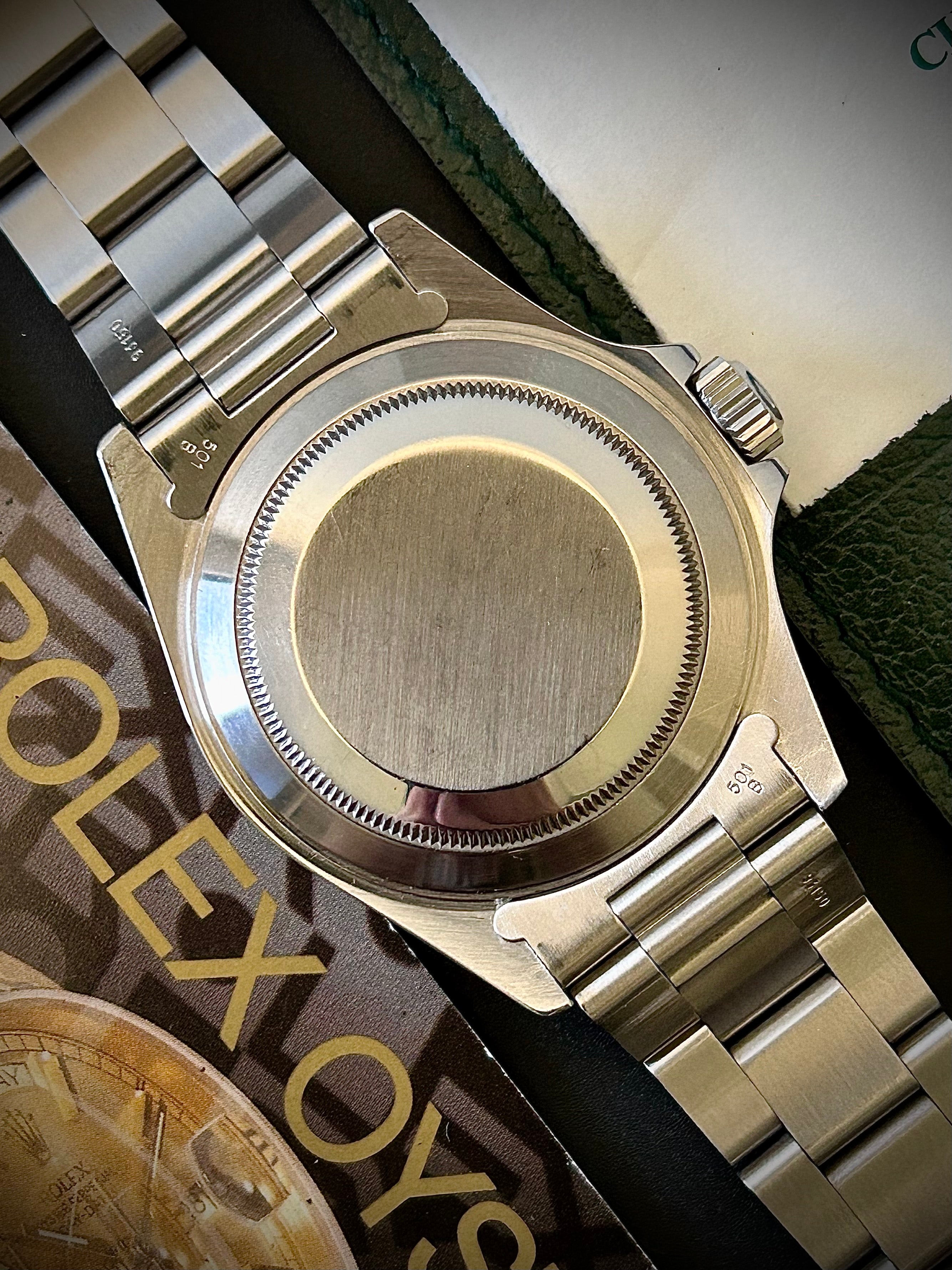 1993 ROLEX SUBMARINER DATE, 16610, BOX AND PAPERS, INC GST