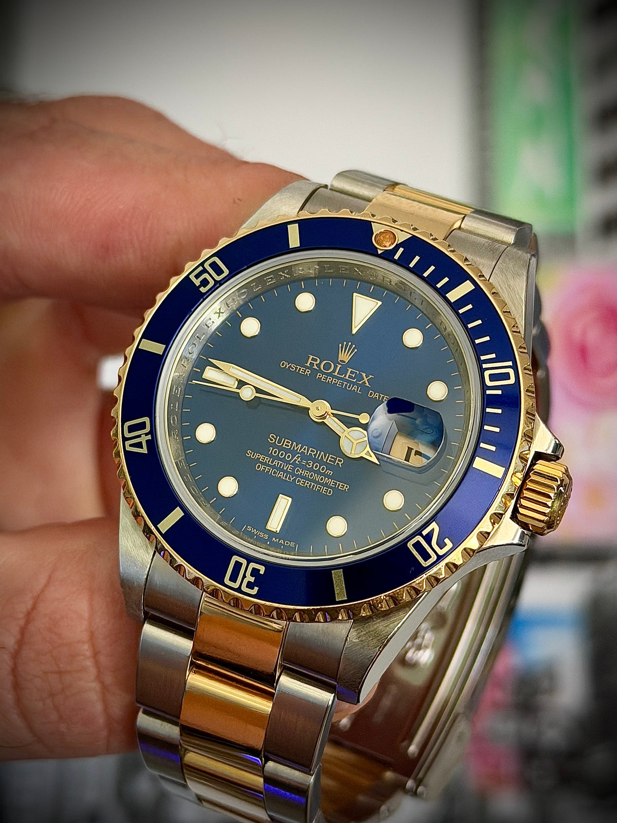 2009 ROLEX SUBMARINER DATE “BLUESY”, 16613LB, ENGRAVED REHAUT, NO HOLES CASE, SOLID END LINKS, WATCH ONLY, INC GST