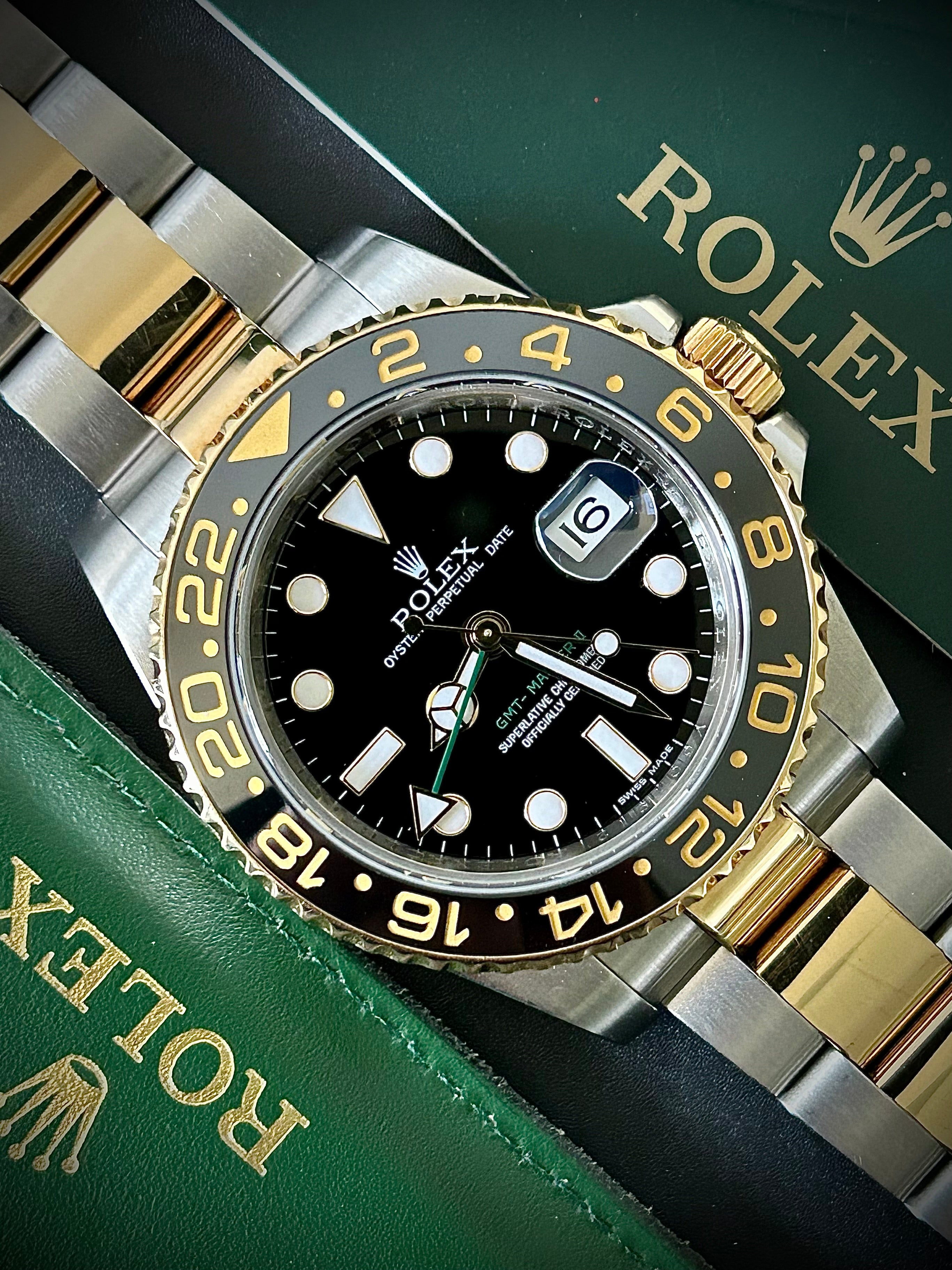 2009 ROLEX GMT MASTER II, 116713LN, BOX AND PAPERS, INC GST