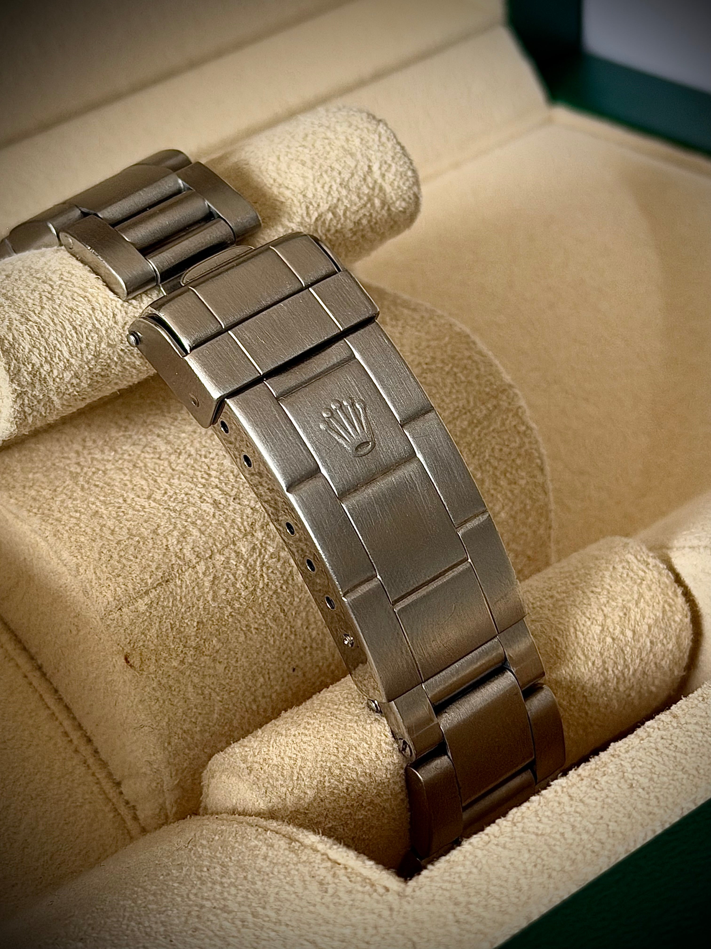 1997 ROLEX SUBMARINER NO-DATE, TWO LINER, 14060, BOX AND PAPERS, INC GST