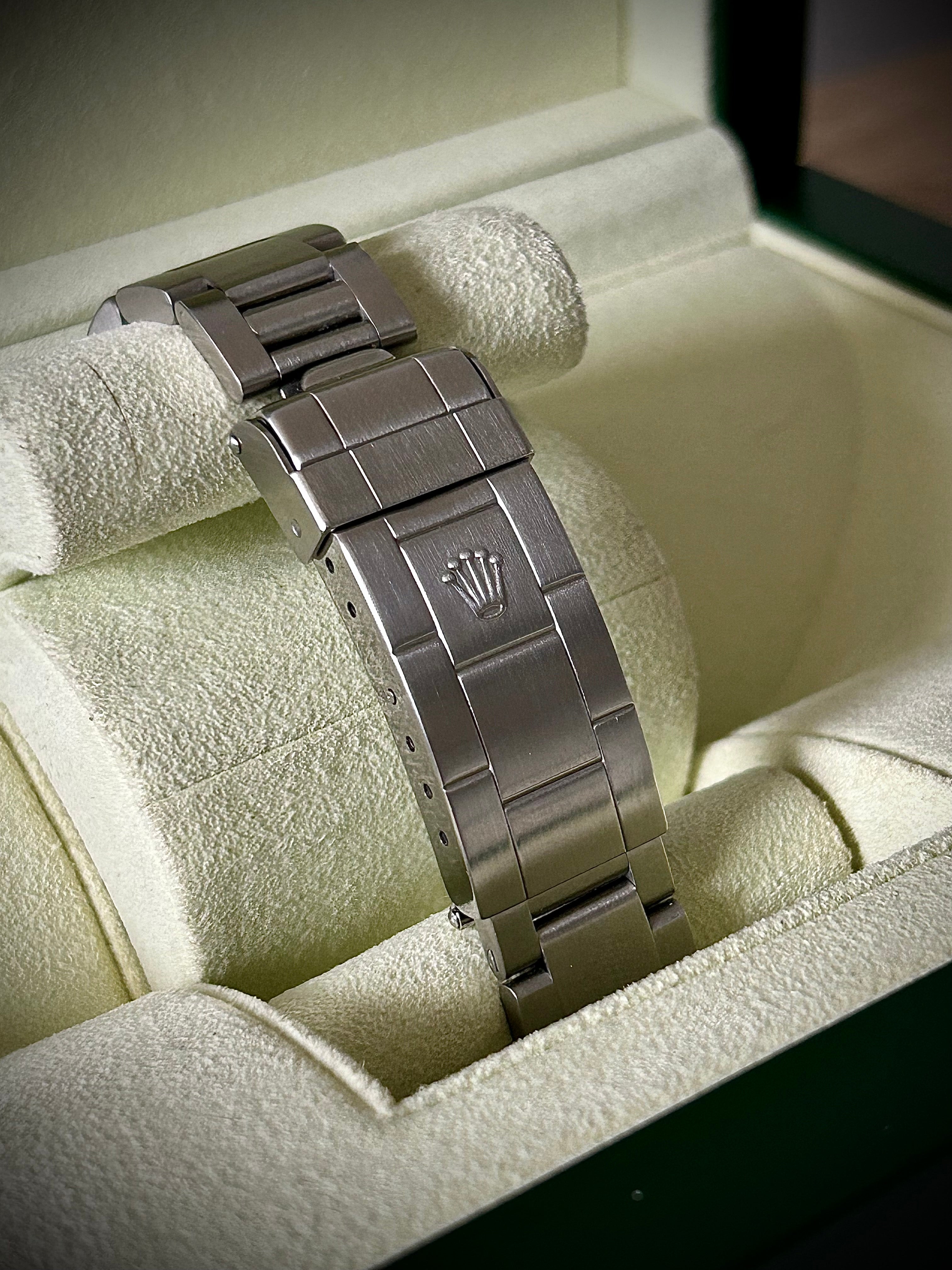 1999 ROLEX SUBMARINER NO-DATE, TWO LINER, SWISS ONLY, 14060, BOX AND PAPERS WITH RSC, INC GST