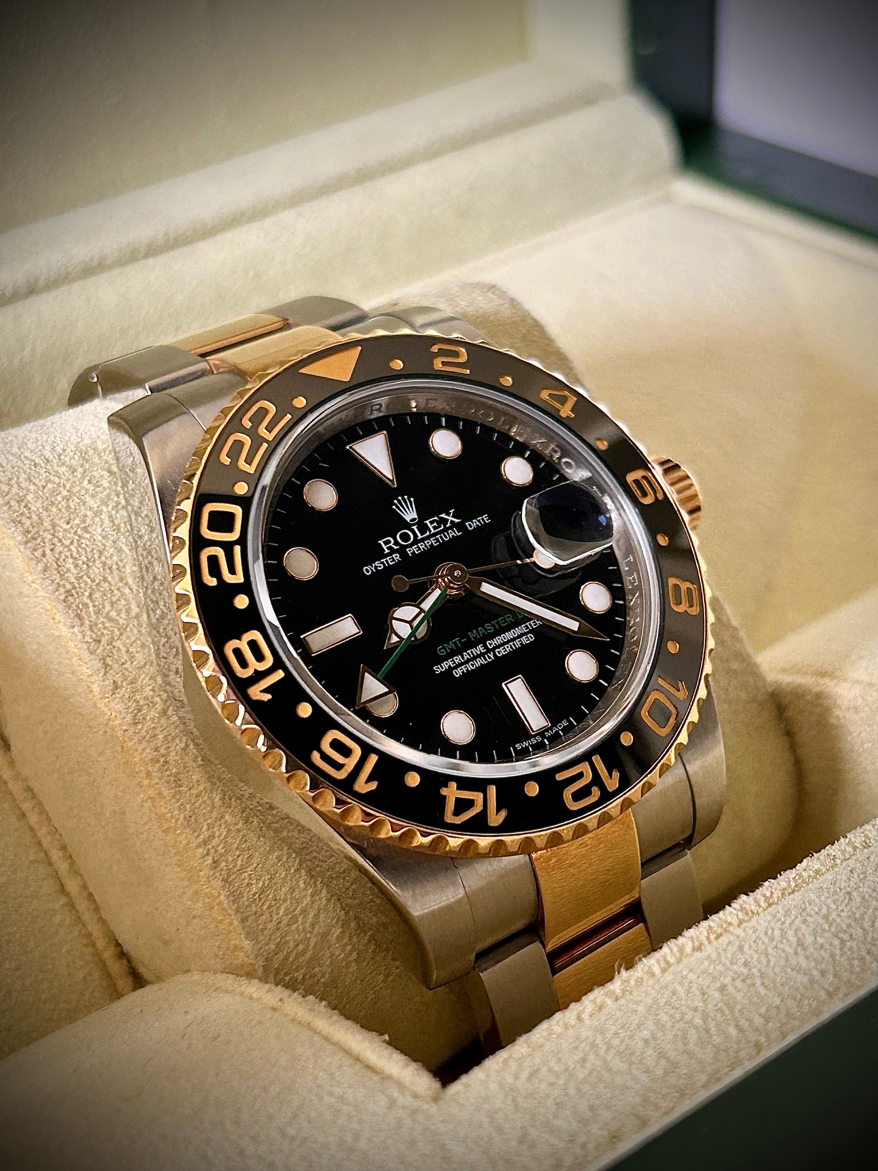 2009 ROLEX GMT MASTER II, 116713LN, BOX AND PAPERS, INC GST