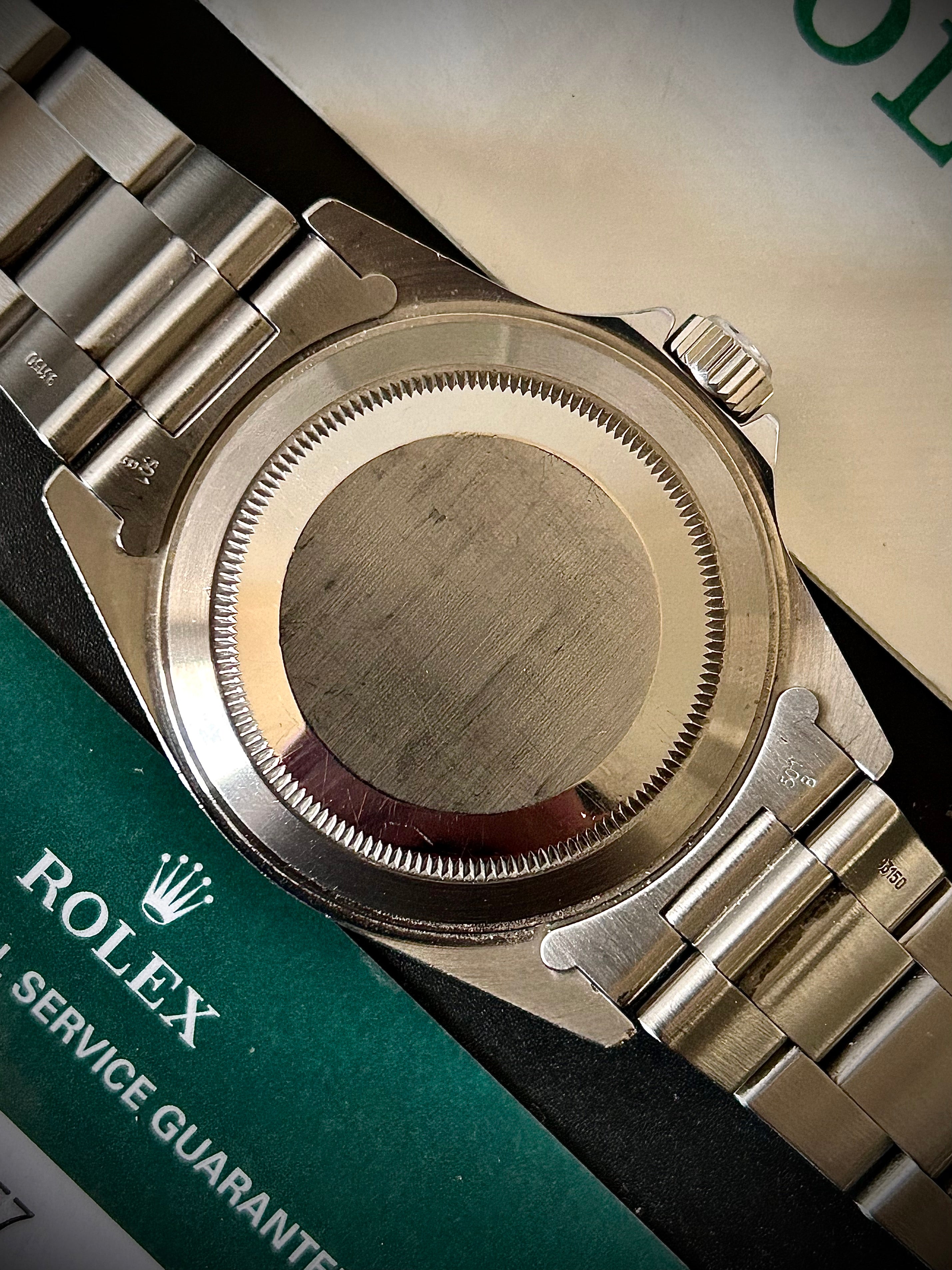 1999 ROLEX SUBMARINER NO-DATE, TWO LINER, SWISS ONLY, 14060, BOX AND PAPERS WITH RSC, INC GST