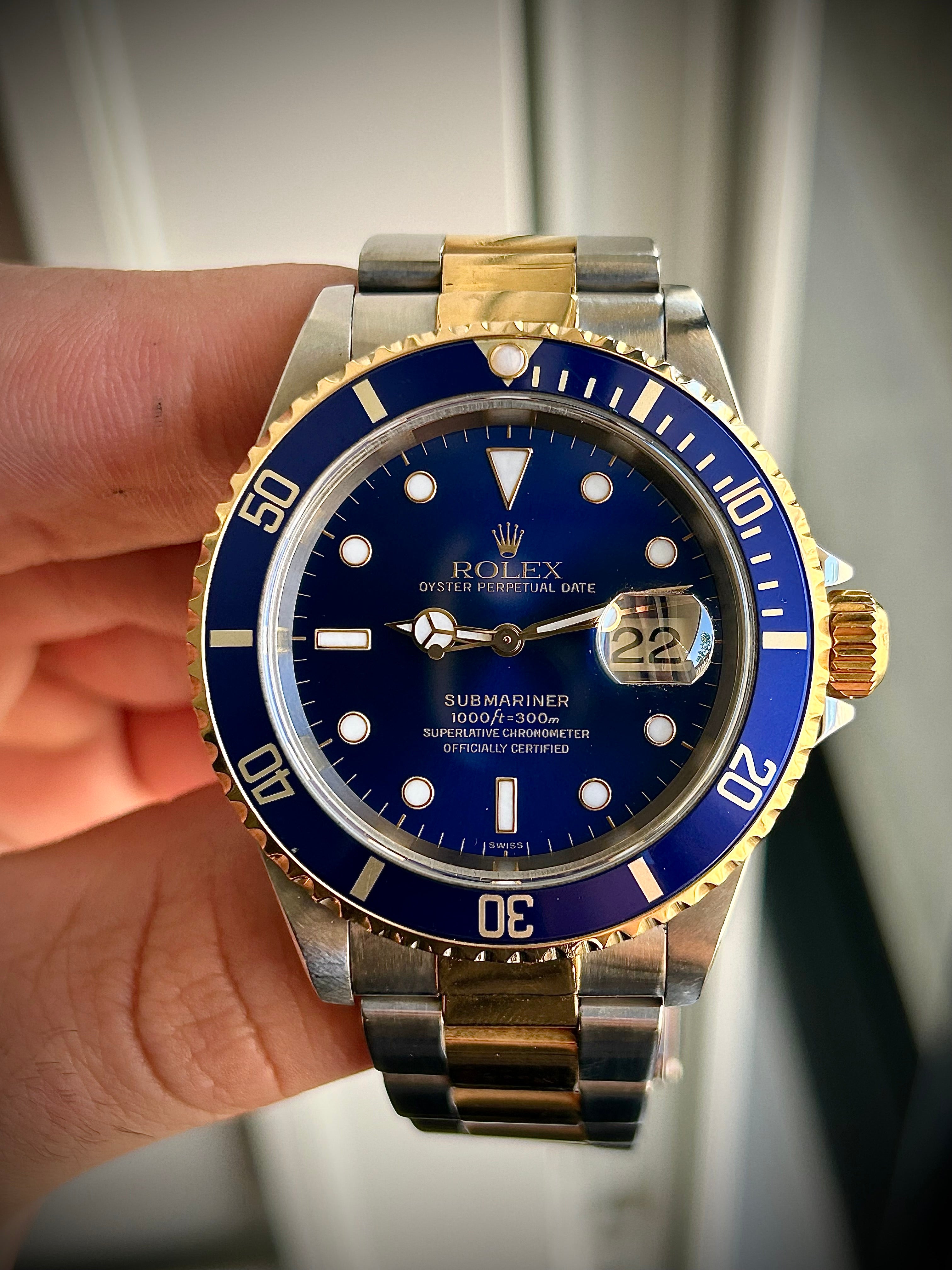 1999 ROLEX SUBMARINER DATE “BLUESY”, SWISS ONLY, FULL SET, INC GST
