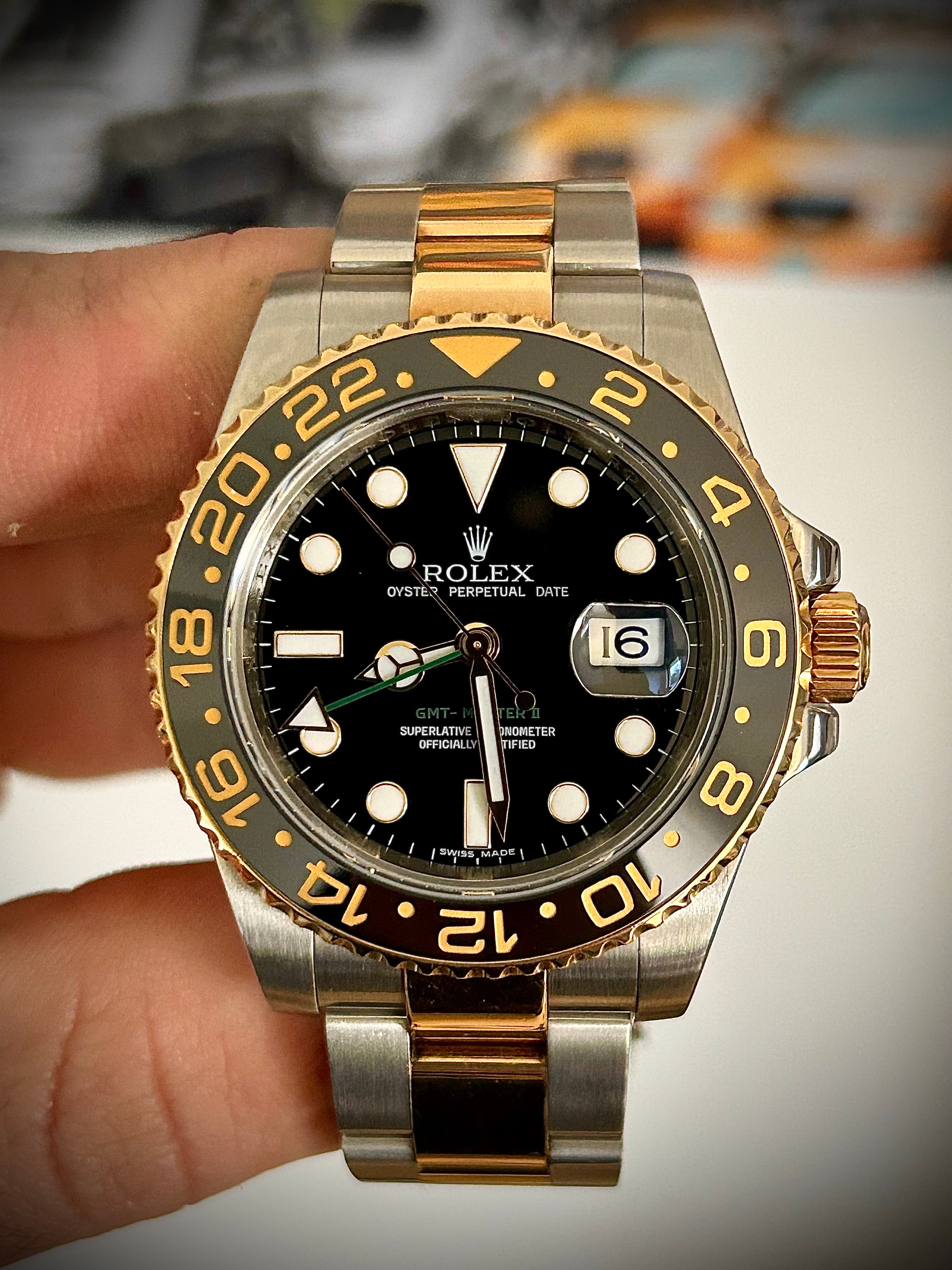 2009 ROLEX GMT MASTER II, 116713LN, BOX AND PAPERS, INC GST