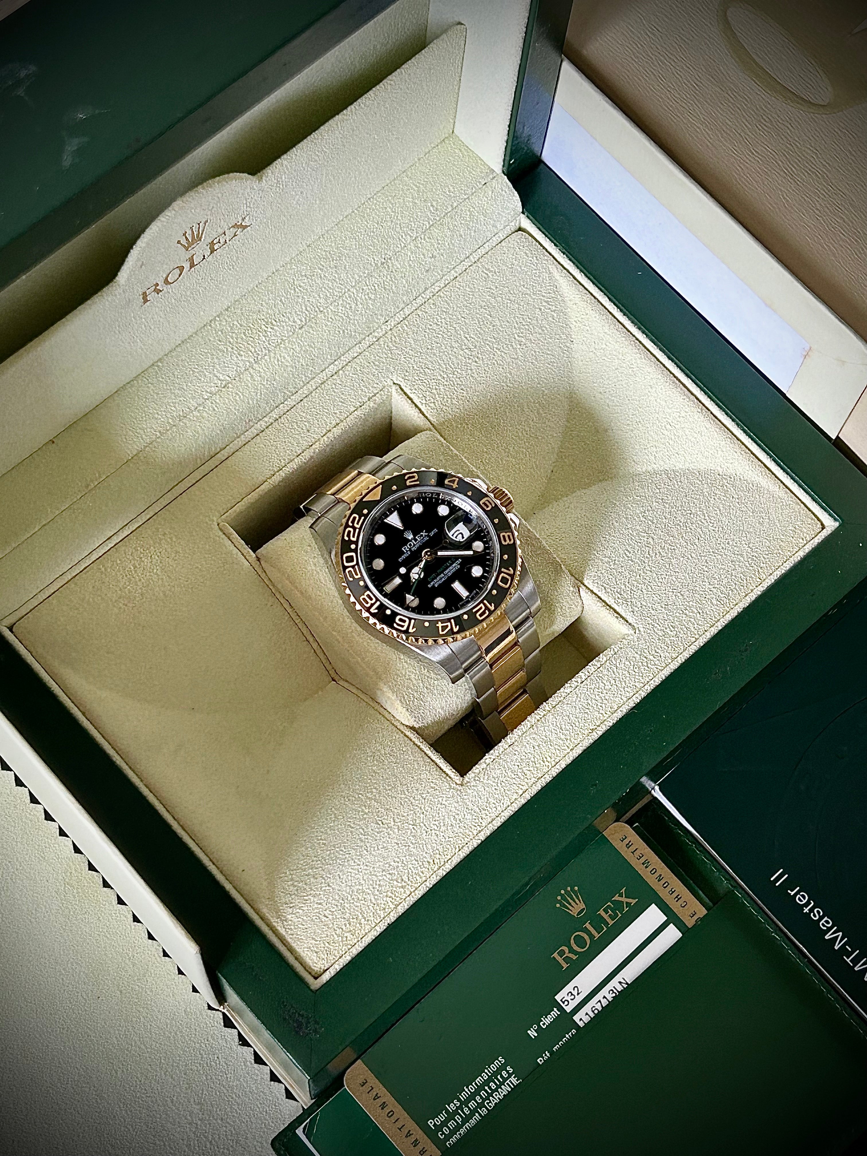 2009 ROLEX GMT MASTER II, 116713LN, BOX AND PAPERS, INC GST