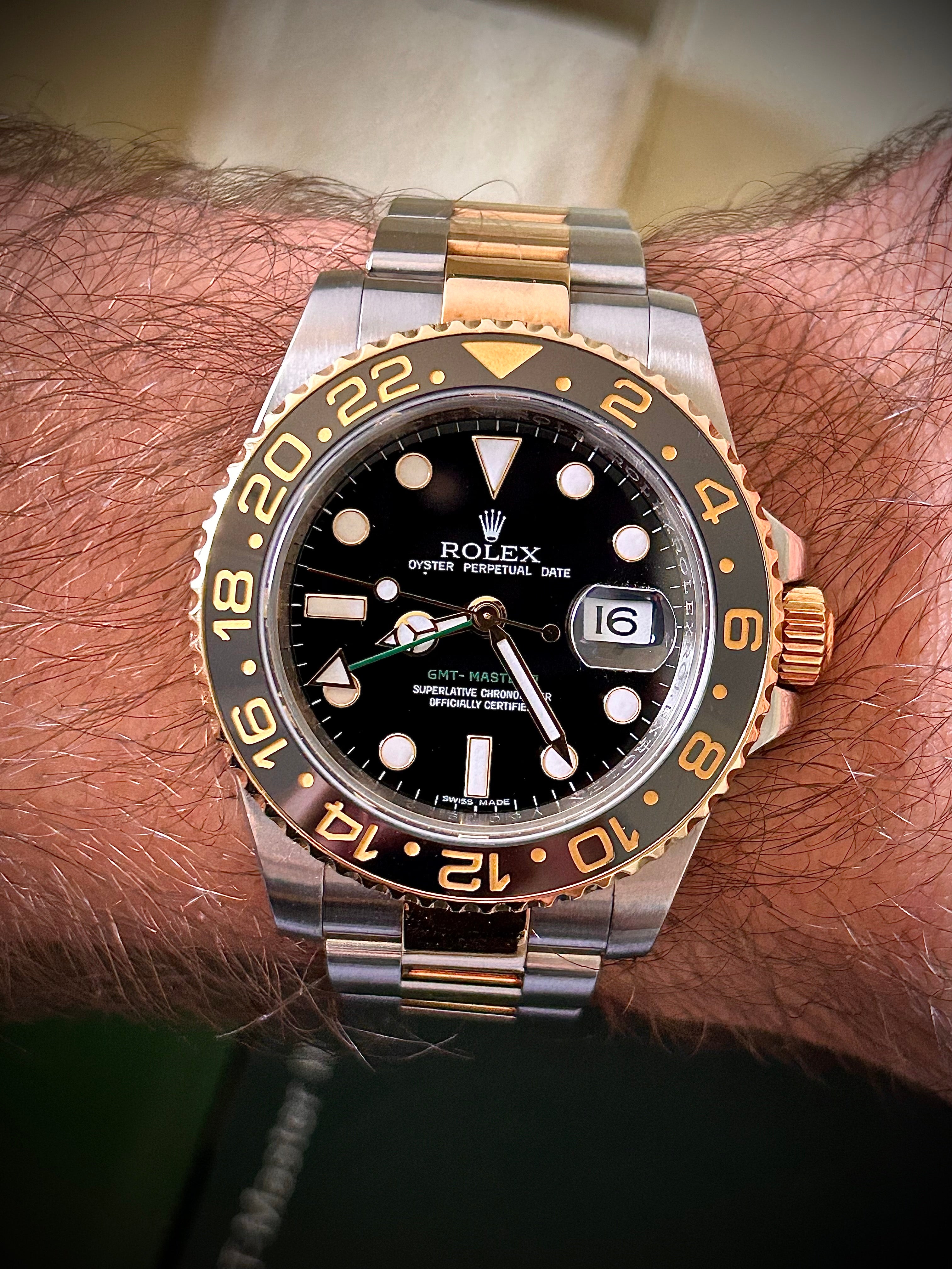 2009 ROLEX GMT MASTER II, 116713LN, BOX AND PAPERS, INC GST