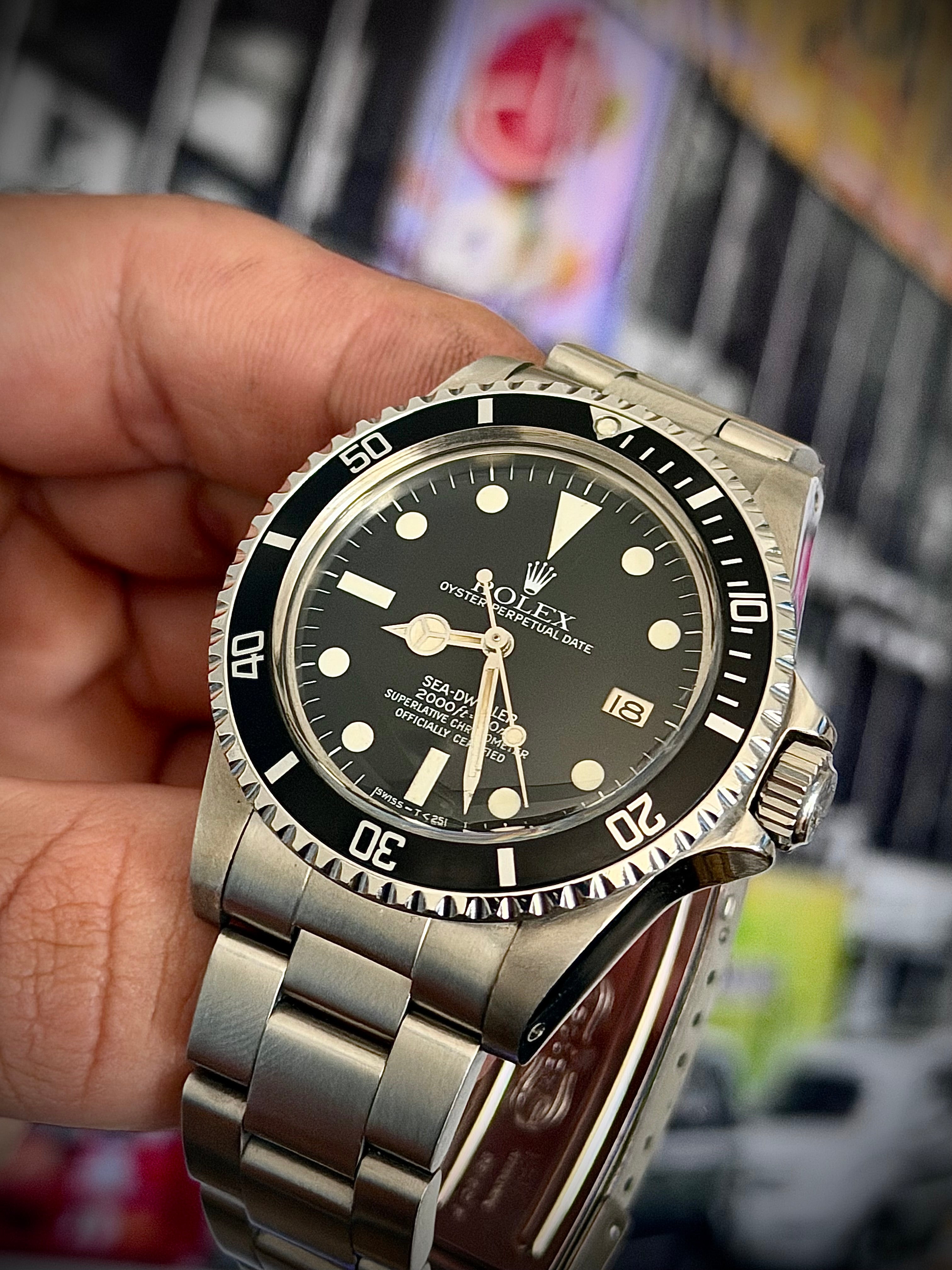 1981 ROLEX SEA-DWELLER 1665 “GREAT WHITE”, BOX AND PAPERS, INC GST