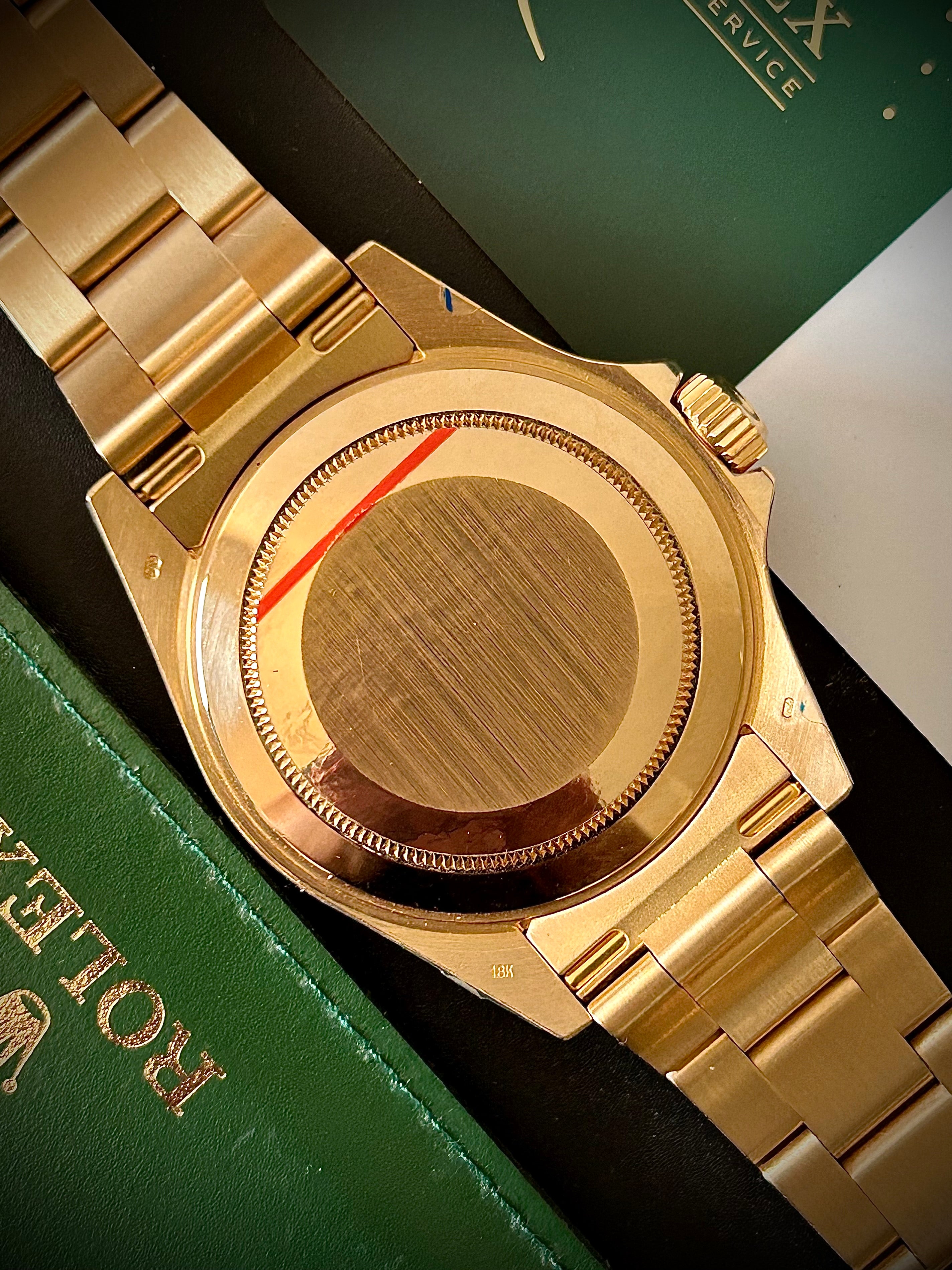 1991 ROLEX SUBMARINER DATE “BLUESY”, FULL GOLD, 16618LB, BOX AND RSC, INC GST