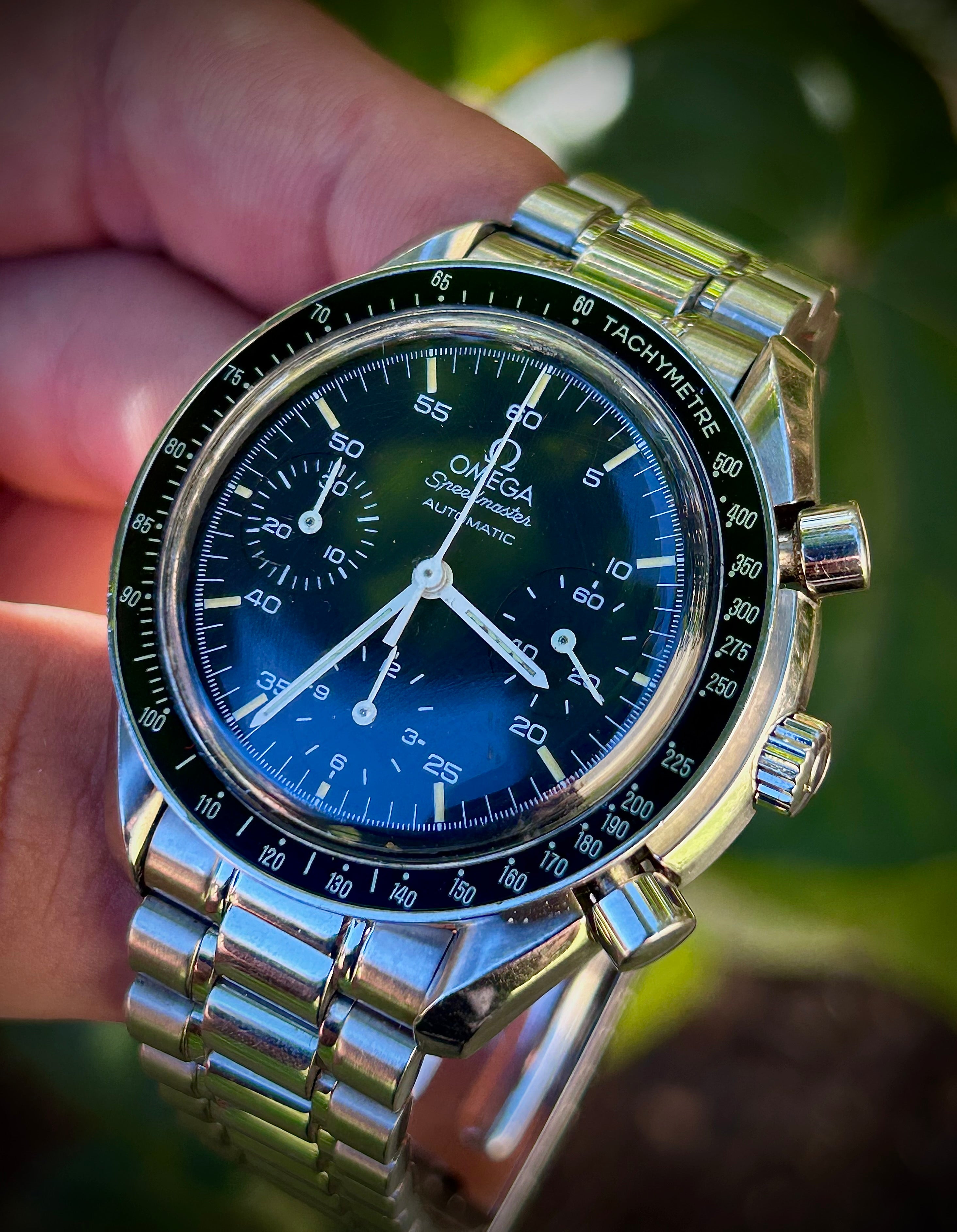 1996 OMEGA SPEEDMASTER REDUCED, WITH BOX, INC GST