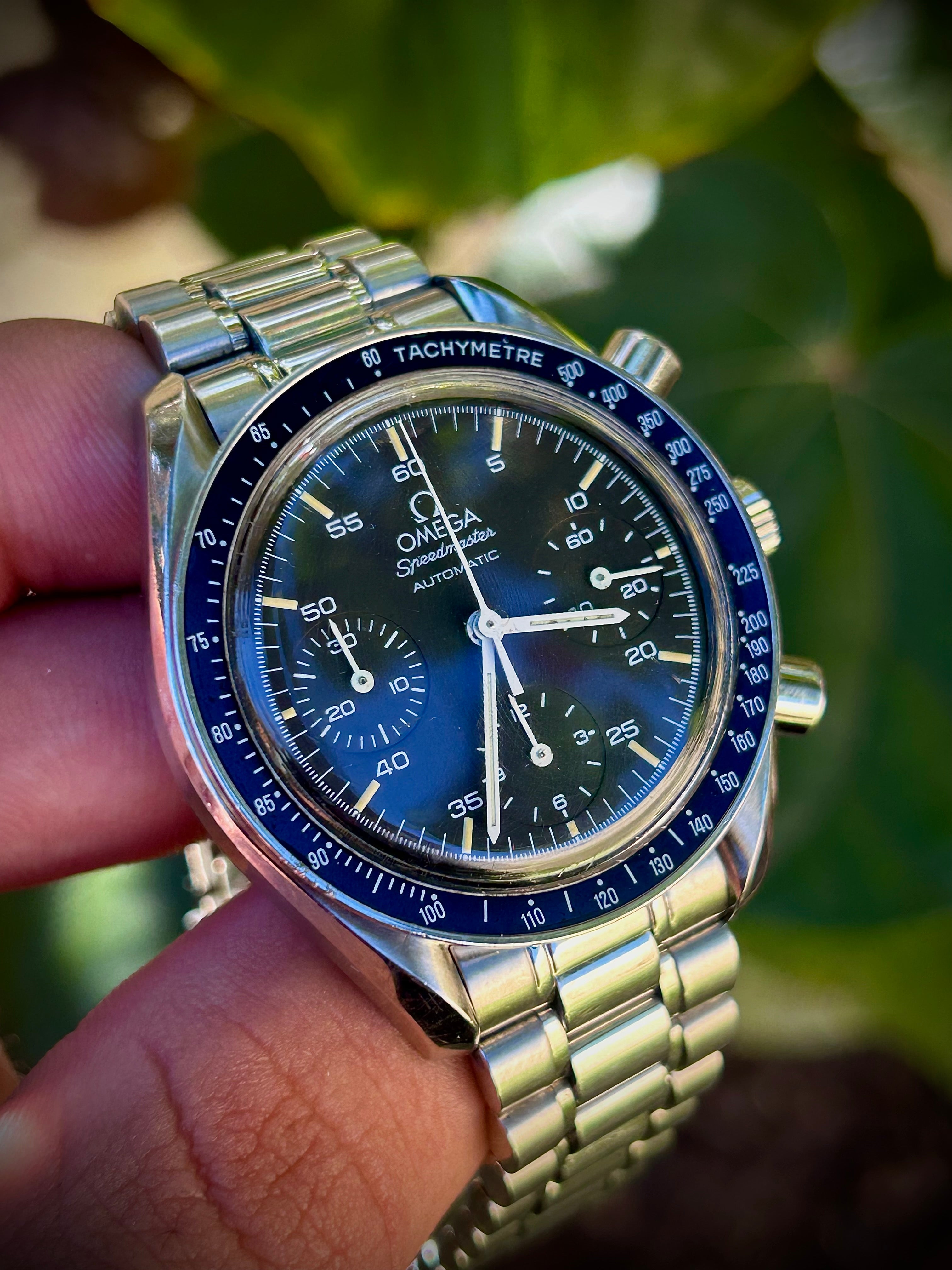 1996 OMEGA SPEEDMASTER REDUCED, WITH BOX, INC GST