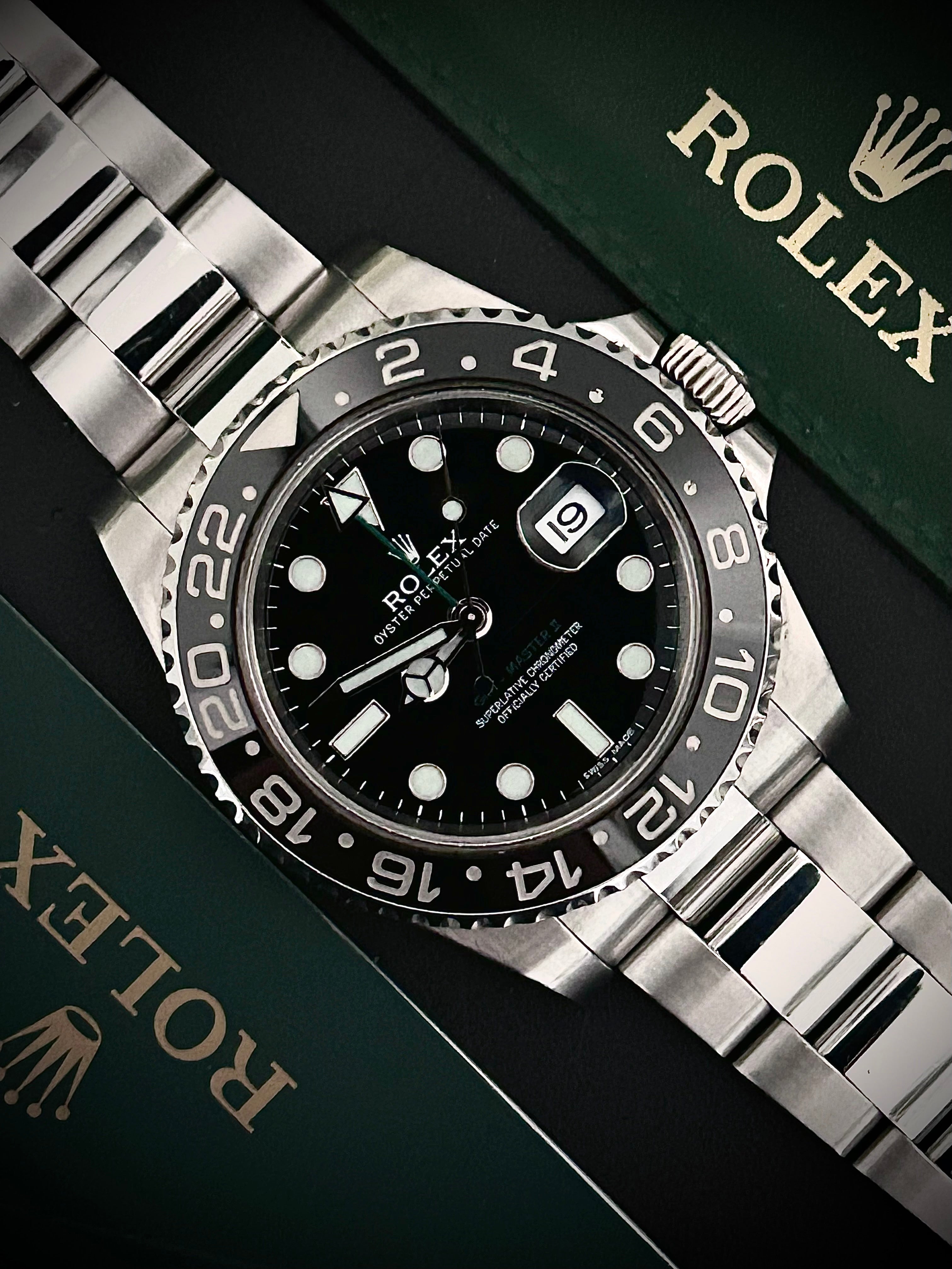 2012 ROLEX GMT MASTER II, RSC SERVICE, 116710LN, FULL SET, INC GST