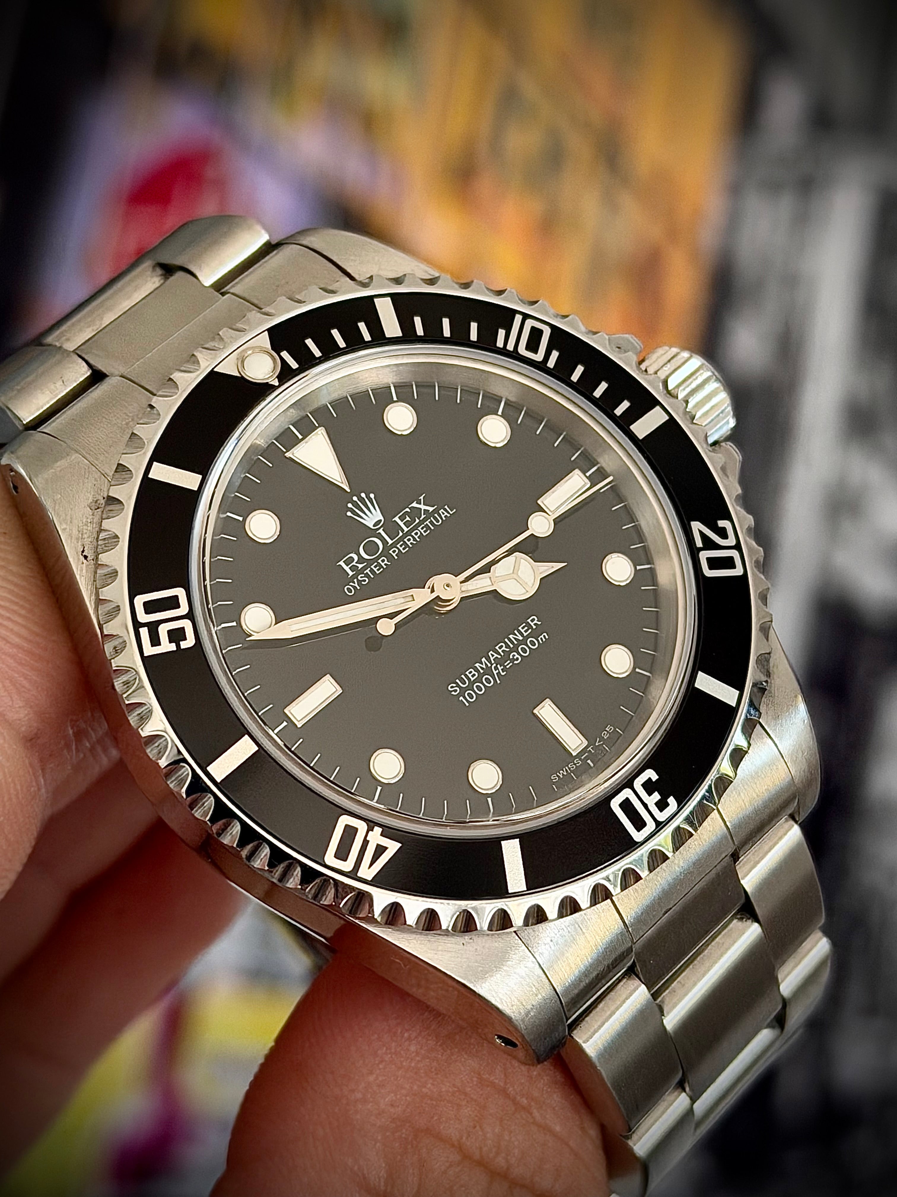 1997 ROLEX SUBMARINER NO-DATE, TWO LINER, 14060, BOX AND PAPERS, INC GST
