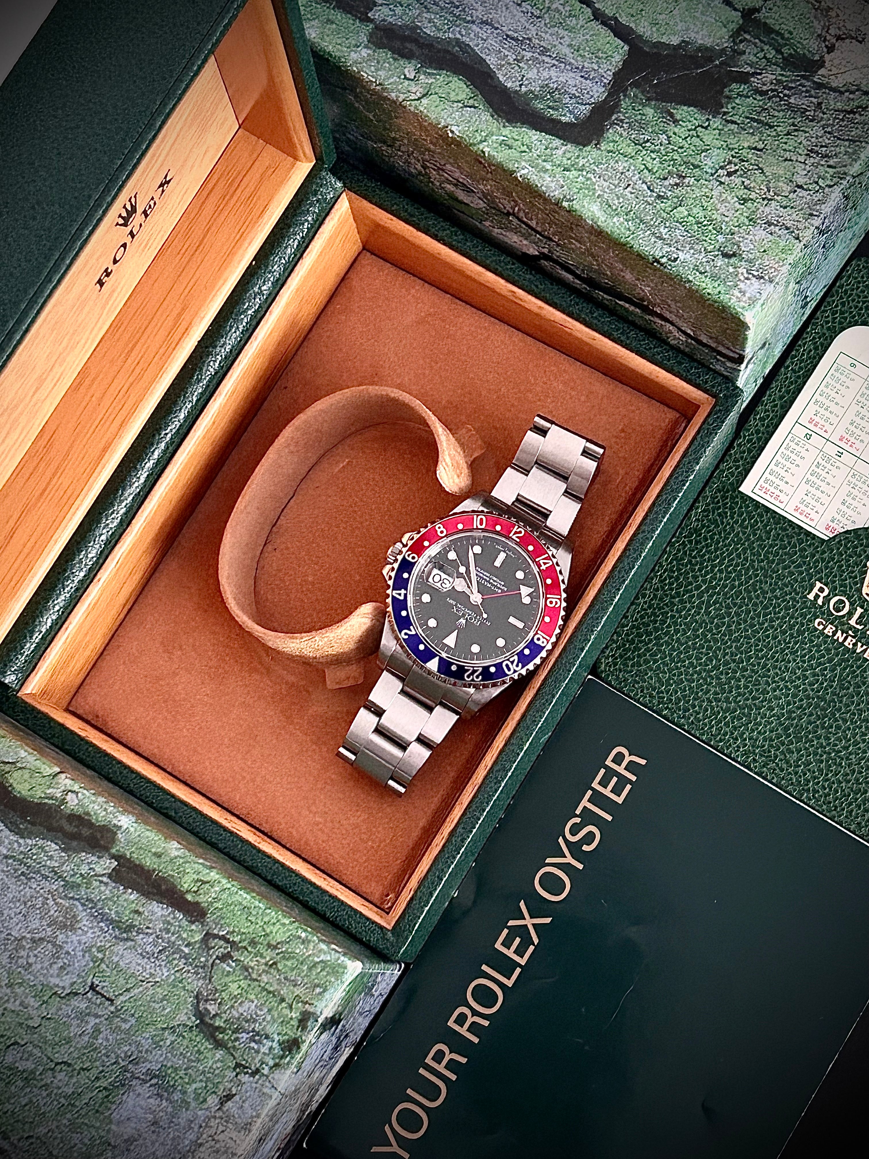 2002 ROLEX GMT MASTER II, PEPSI, 16710, BOX AND BOOKLETS, INC GST