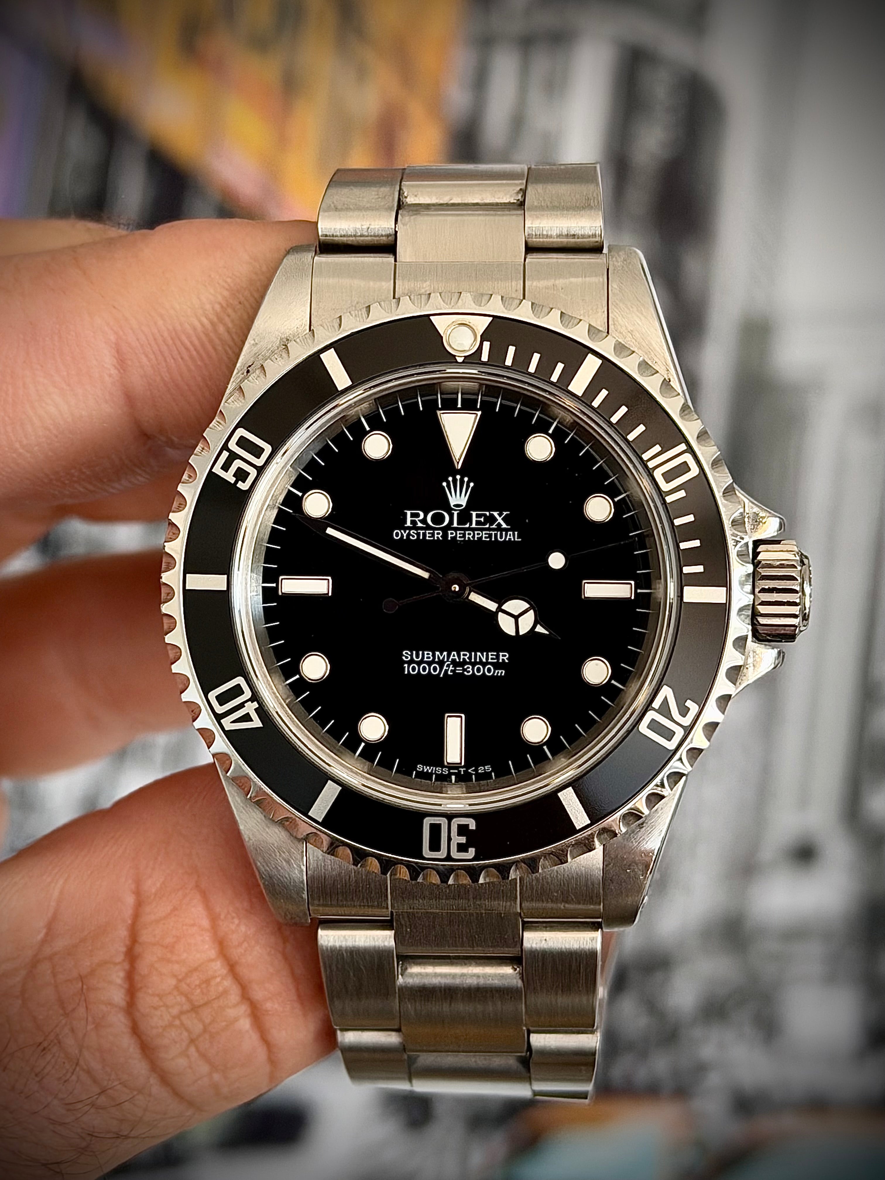 1997 ROLEX SUBMARINER NO-DATE, TWO LINER, 14060, BOX AND PAPERS, INC GST