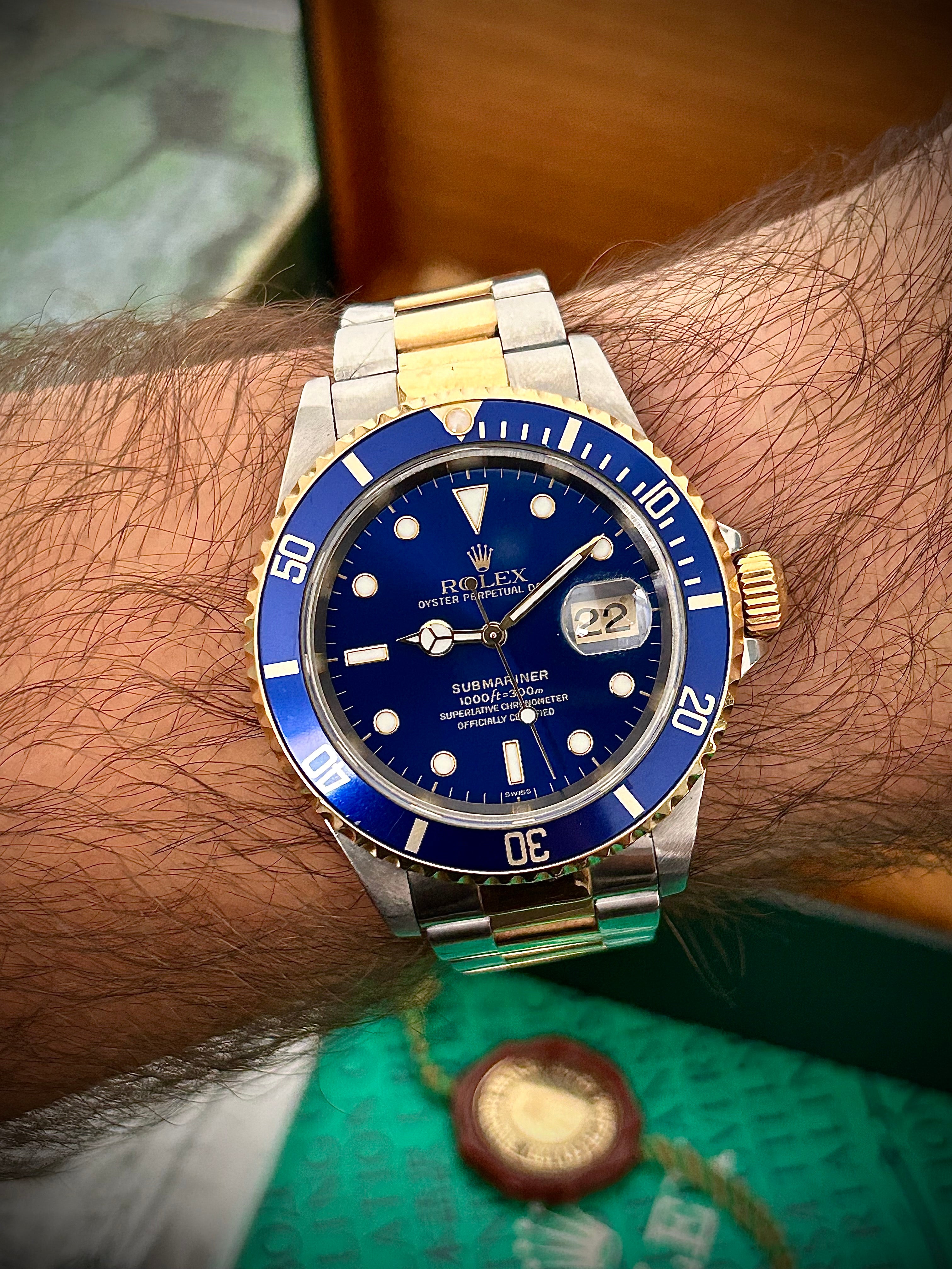 1999 ROLEX SUBMARINER DATE “BLUESY”, SWISS ONLY, FULL SET, INC GST