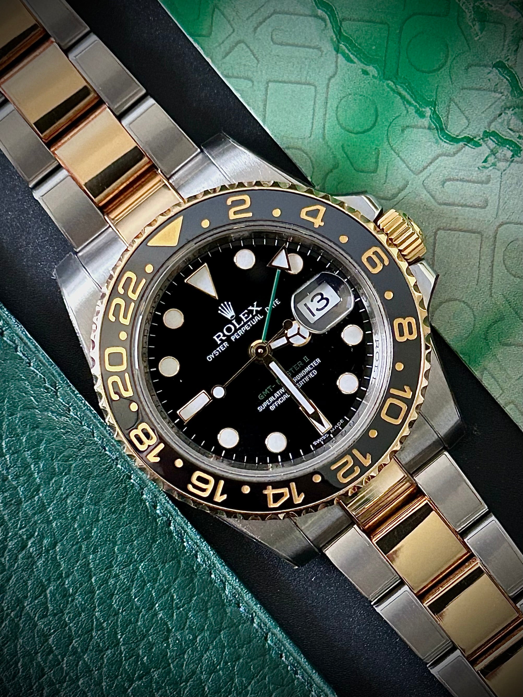 2006 ROLEX GMT MASTER II, 116713LN, BOX AND PAPERS, INC GST