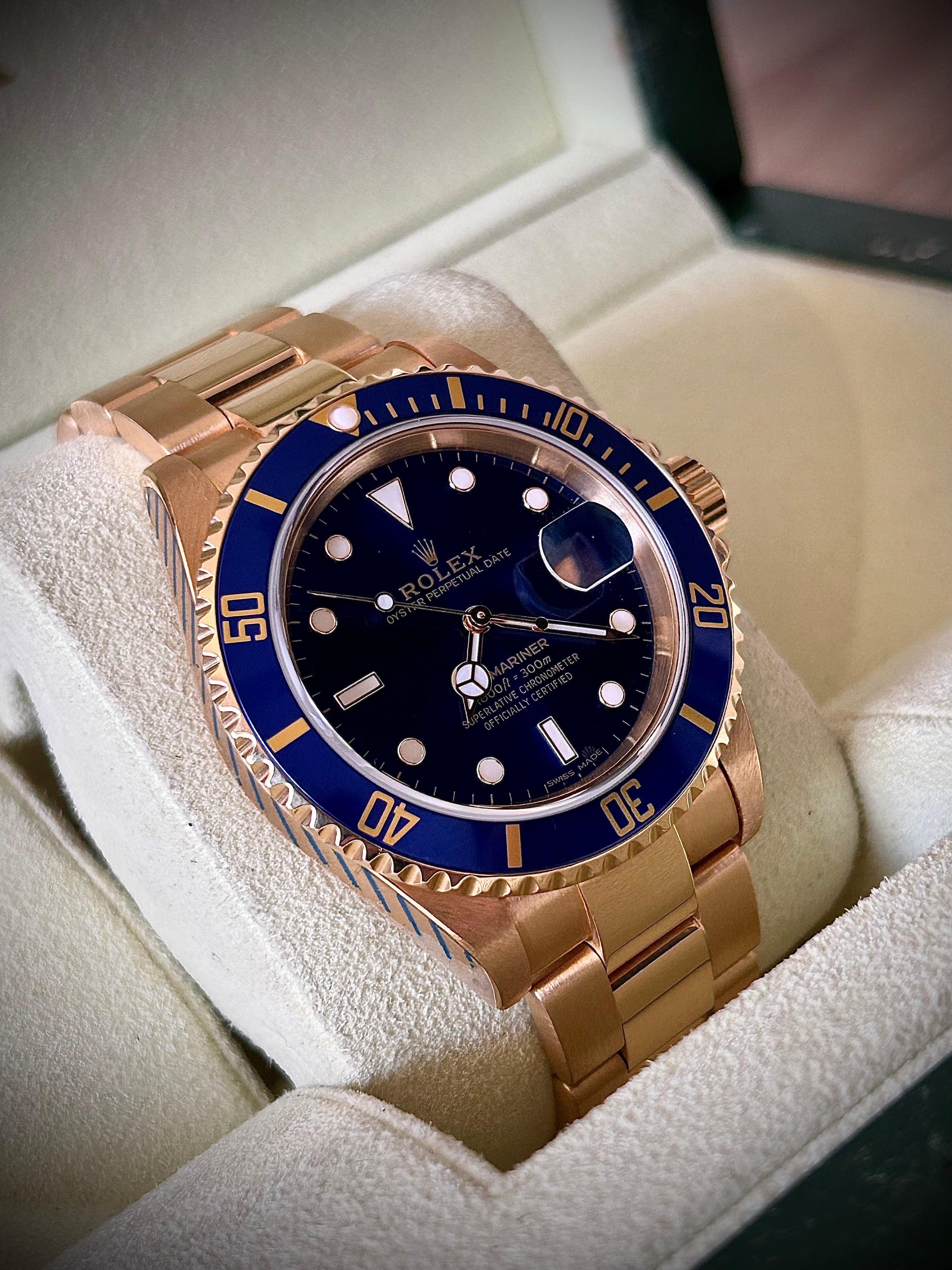 1991 ROLEX SUBMARINER DATE “BLUESY”, FULL GOLD, 16618LB, BOX AND RSC, INC GST