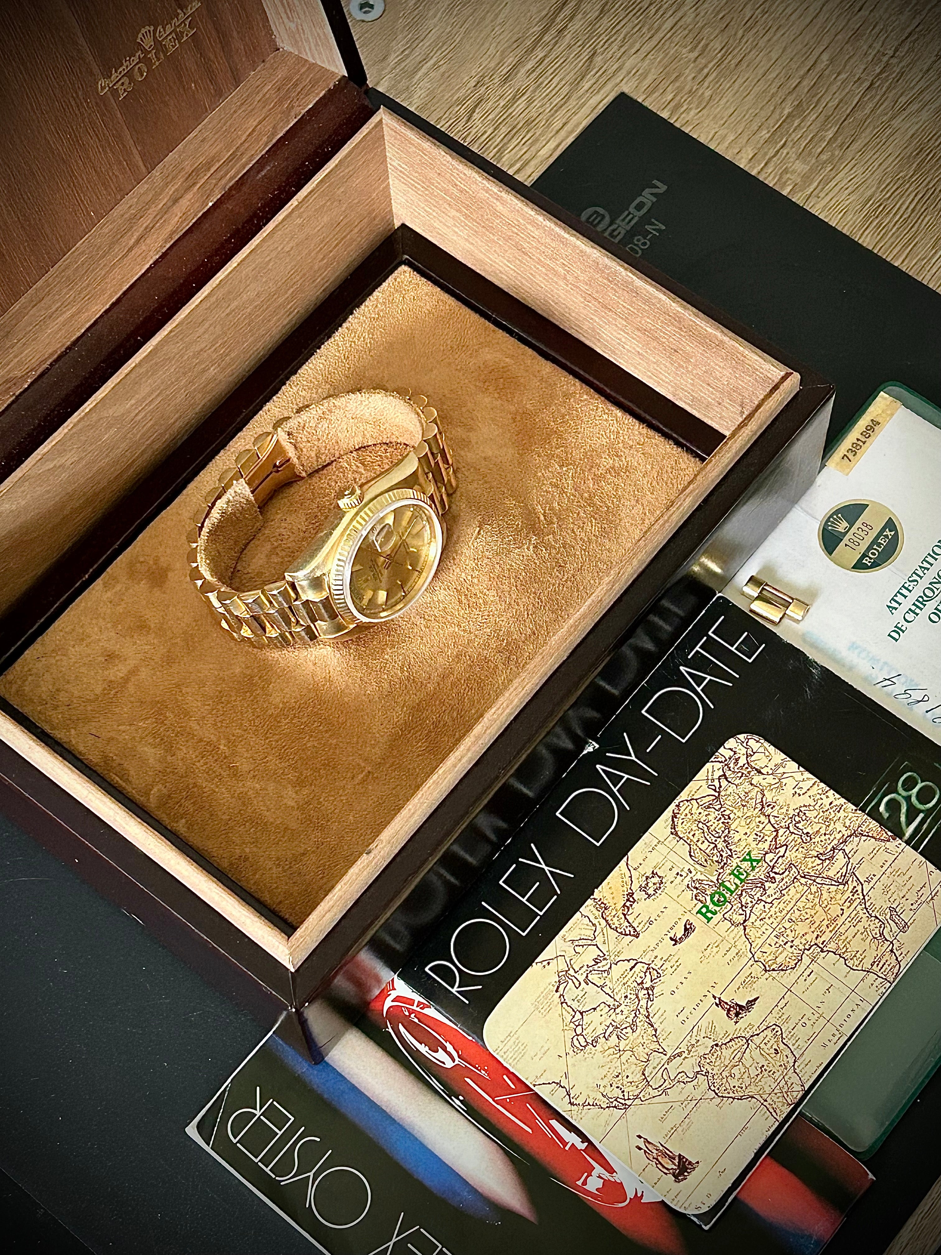 1982 ROLEX DAY-DATE, 18038, BOX AND PAPERS, INC GST