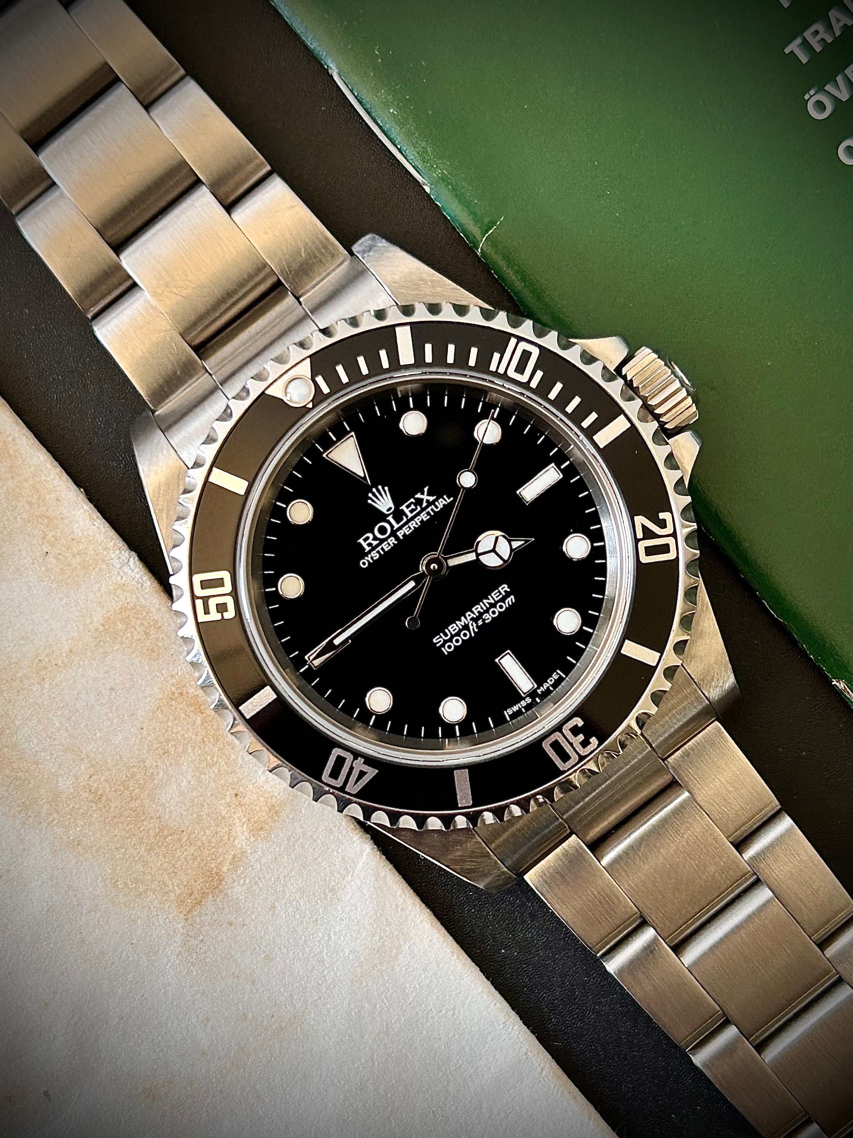 2006 ROLEX SUBMARINER TWO-LINER 14060M, FULL SET, INC GST
