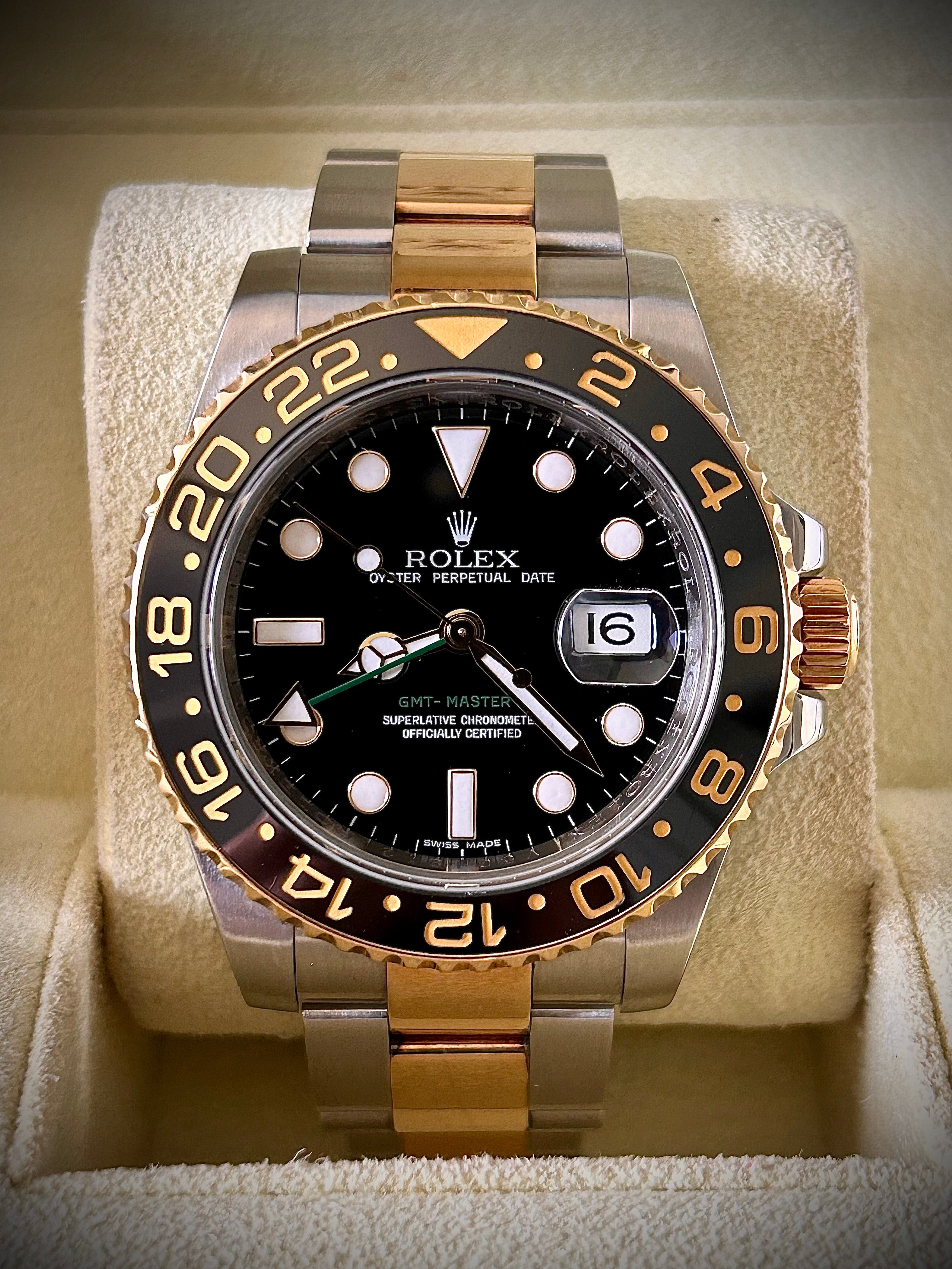 2009 ROLEX GMT MASTER II, 116713LN, BOX AND PAPERS, INC GST