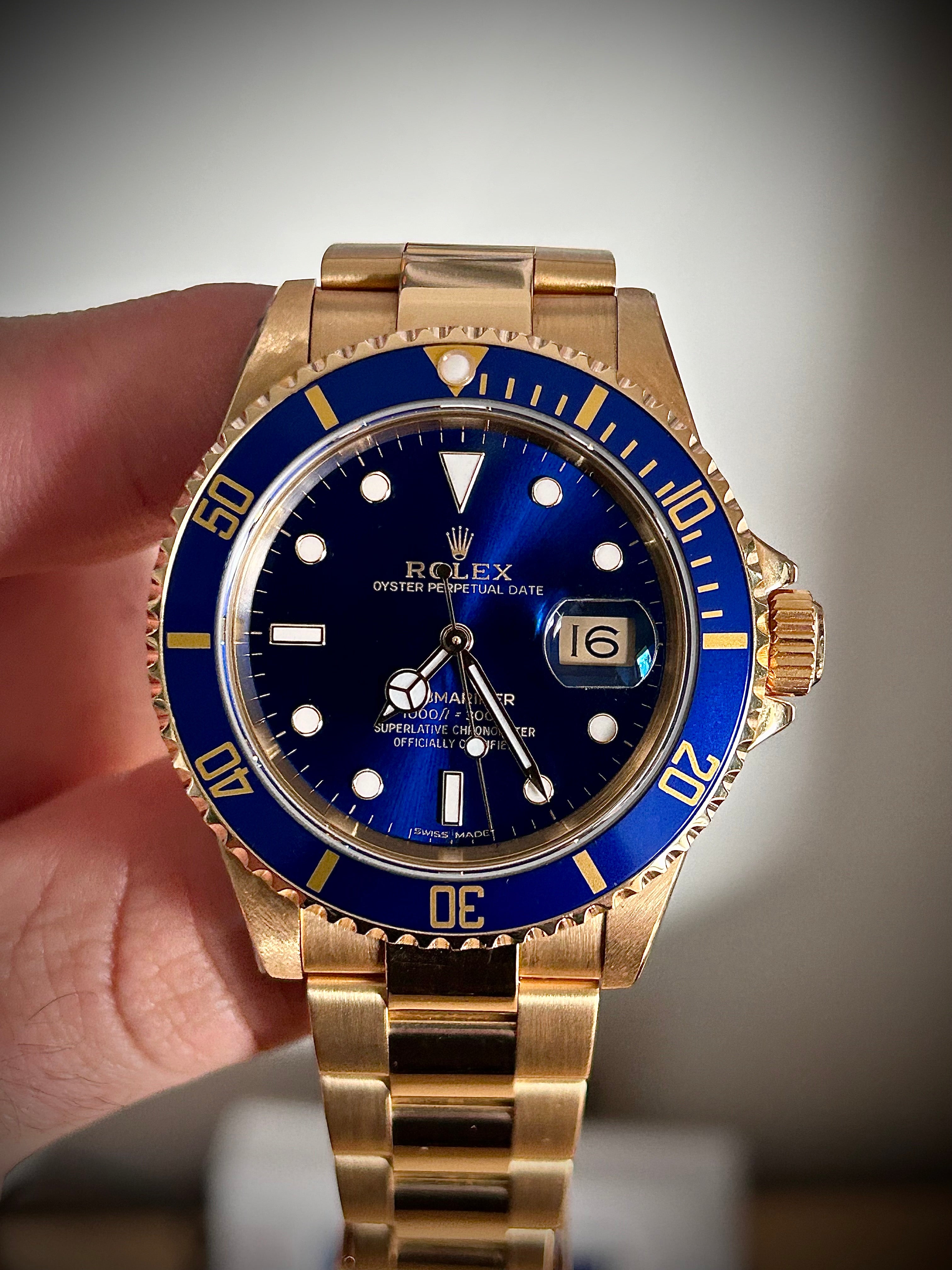 1991 ROLEX SUBMARINER DATE “BLUESY”, FULL GOLD, 16618LB, BOX AND RSC, INC GST