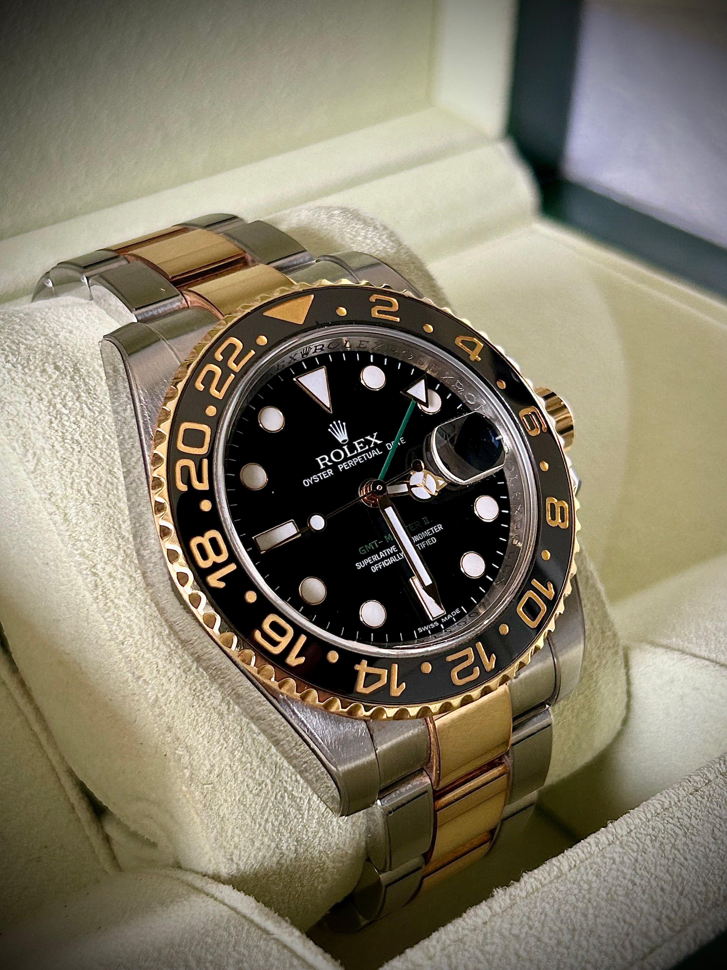 2006 ROLEX GMT MASTER II, 116713LN, BOX AND PAPERS, INC GST