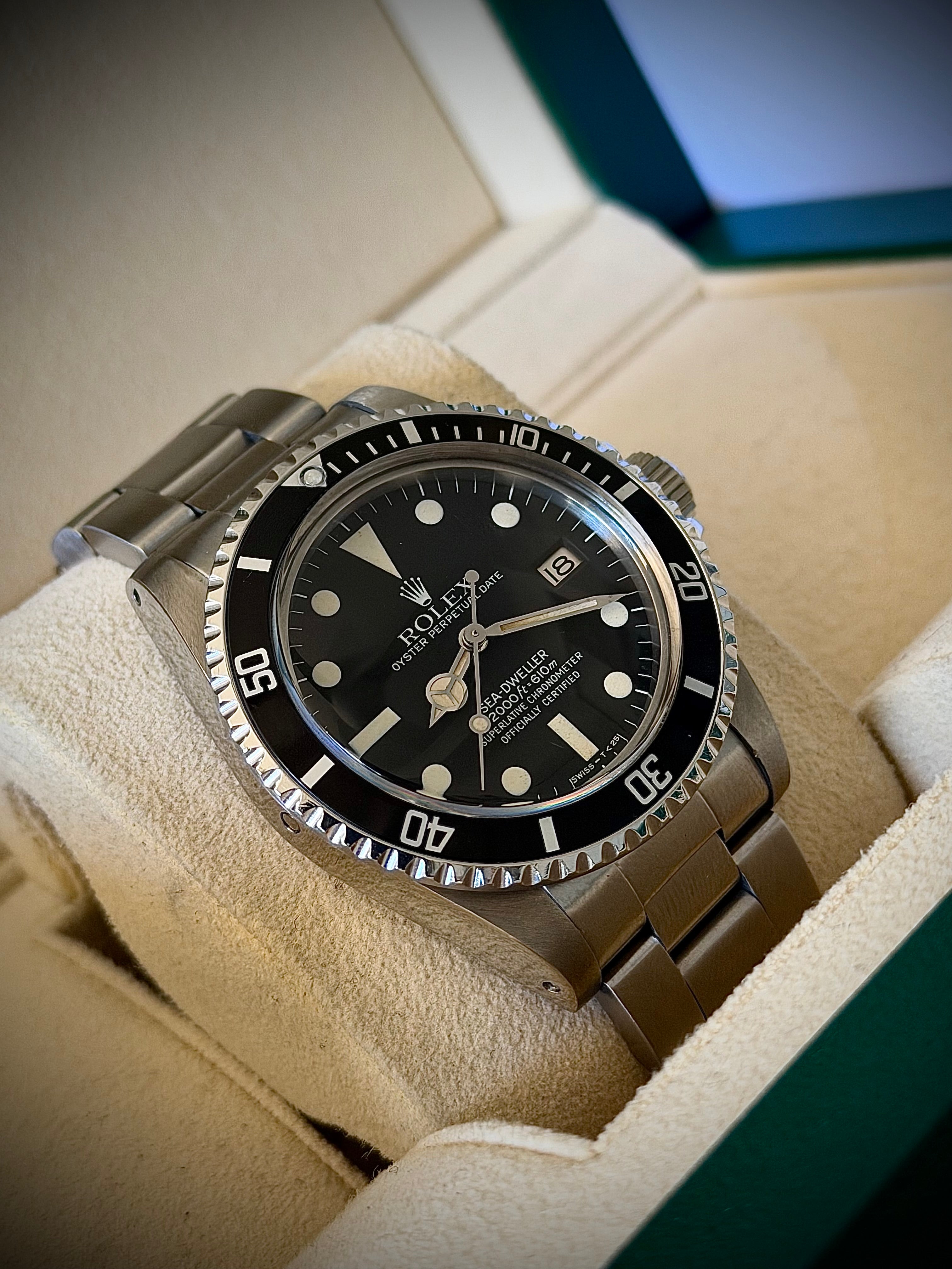 1981 ROLEX SEA-DWELLER 1665 “GREAT WHITE”, BOX AND PAPERS, INC GST