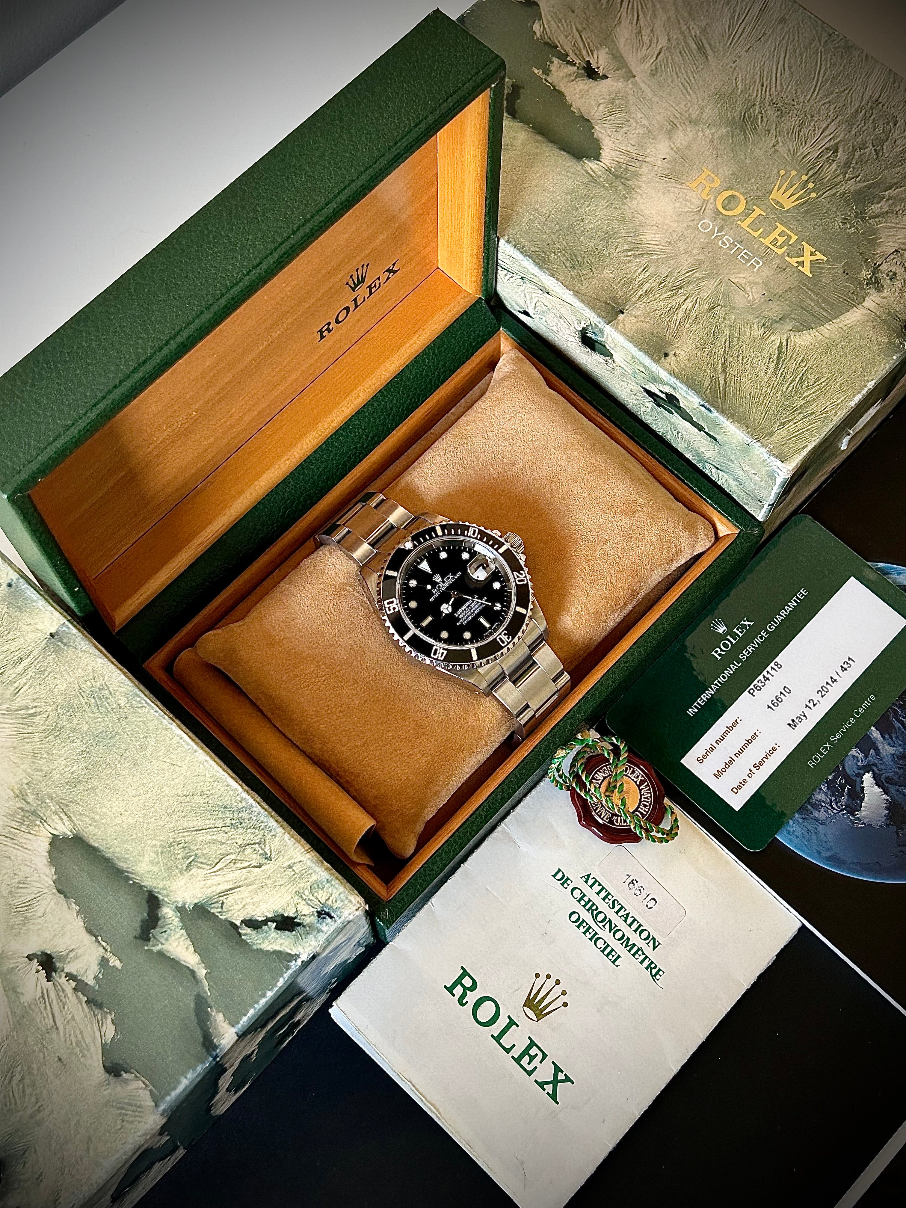 2000 ROLEX SUBMARINER DATE, 16610, BOX AND PAPERS WITH RSC, INC GST
