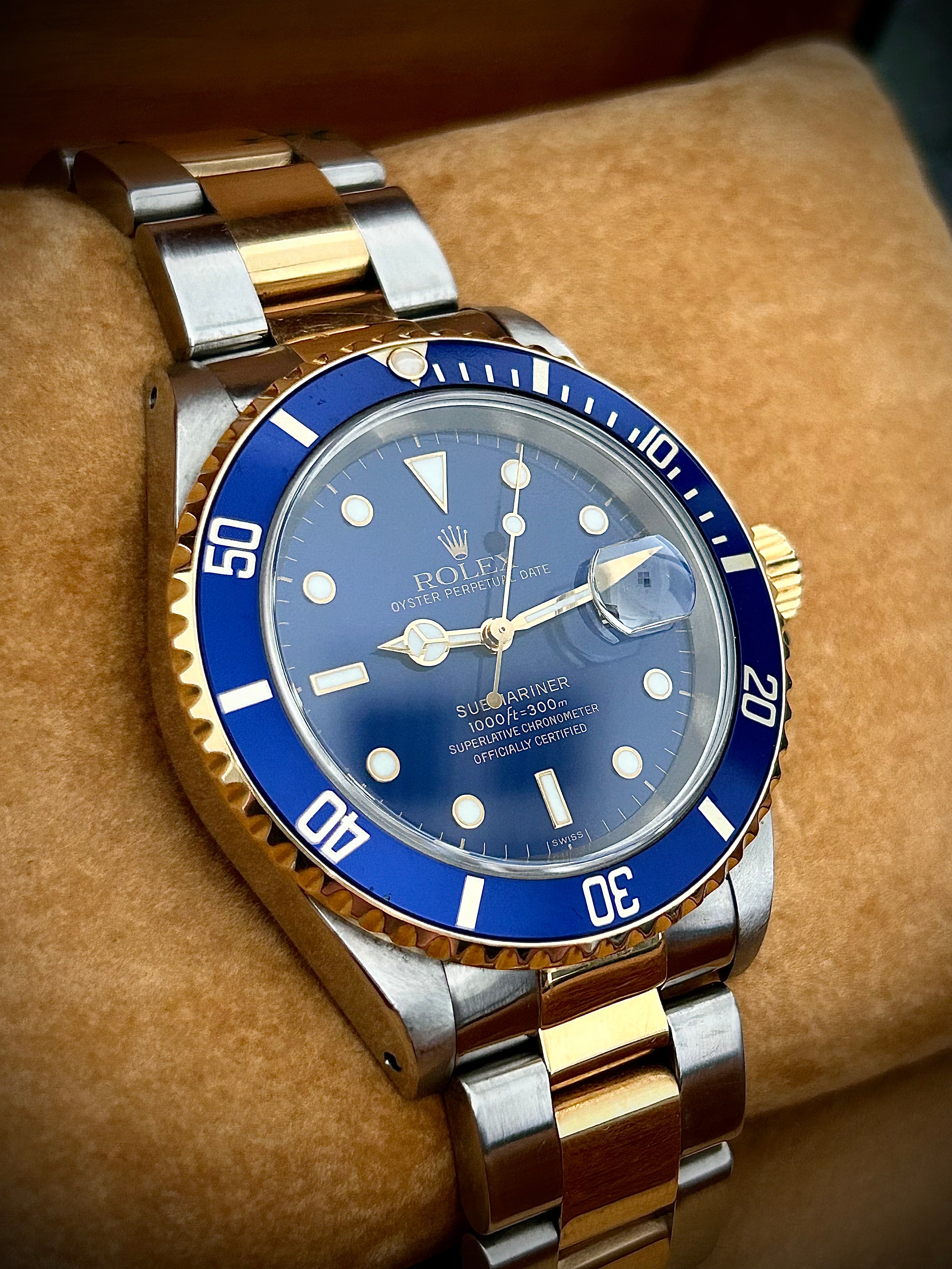1999 ROLEX SUBMARINER DATE “BLUESY”, SWISS ONLY, FULL SET, INC GST