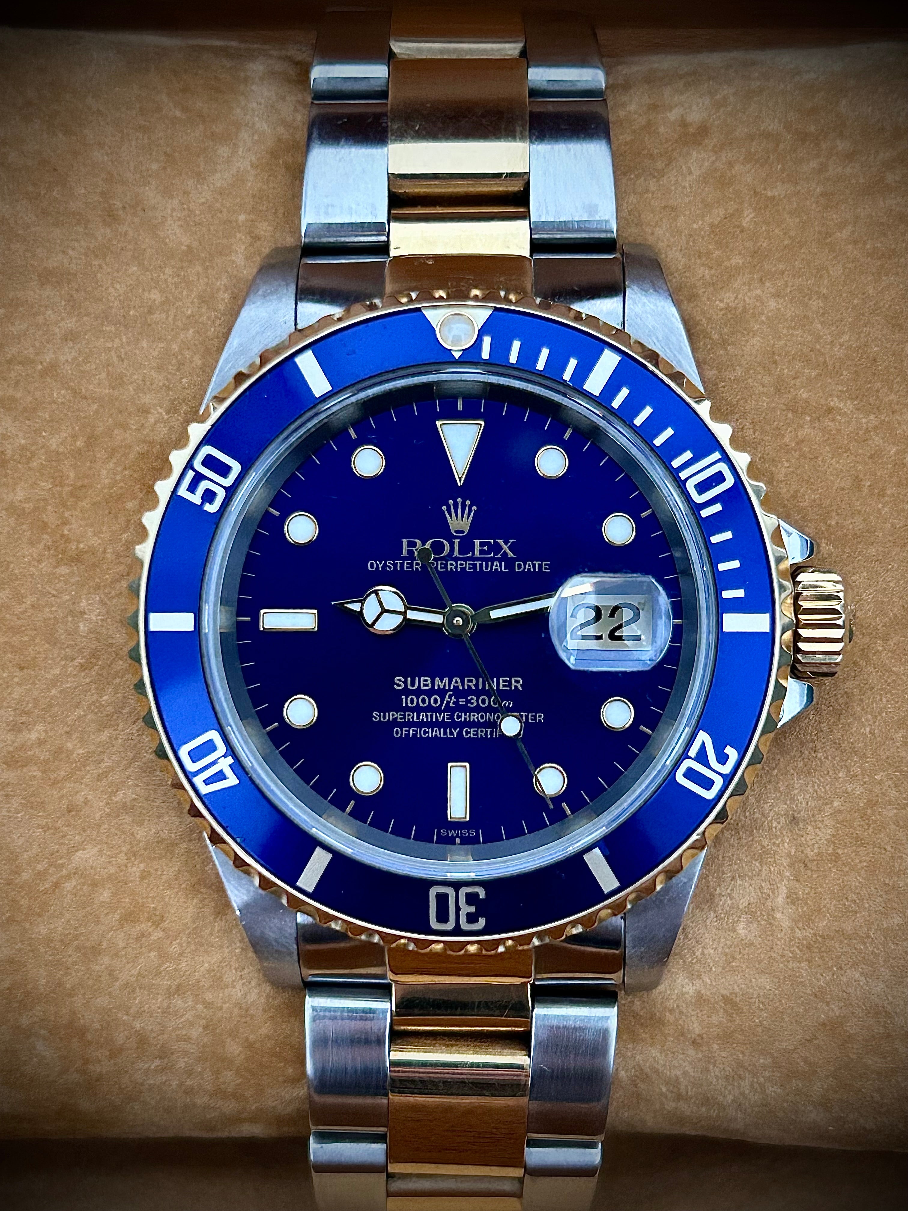1999 ROLEX SUBMARINER DATE “BLUESY”, SWISS ONLY, FULL SET, INC GST