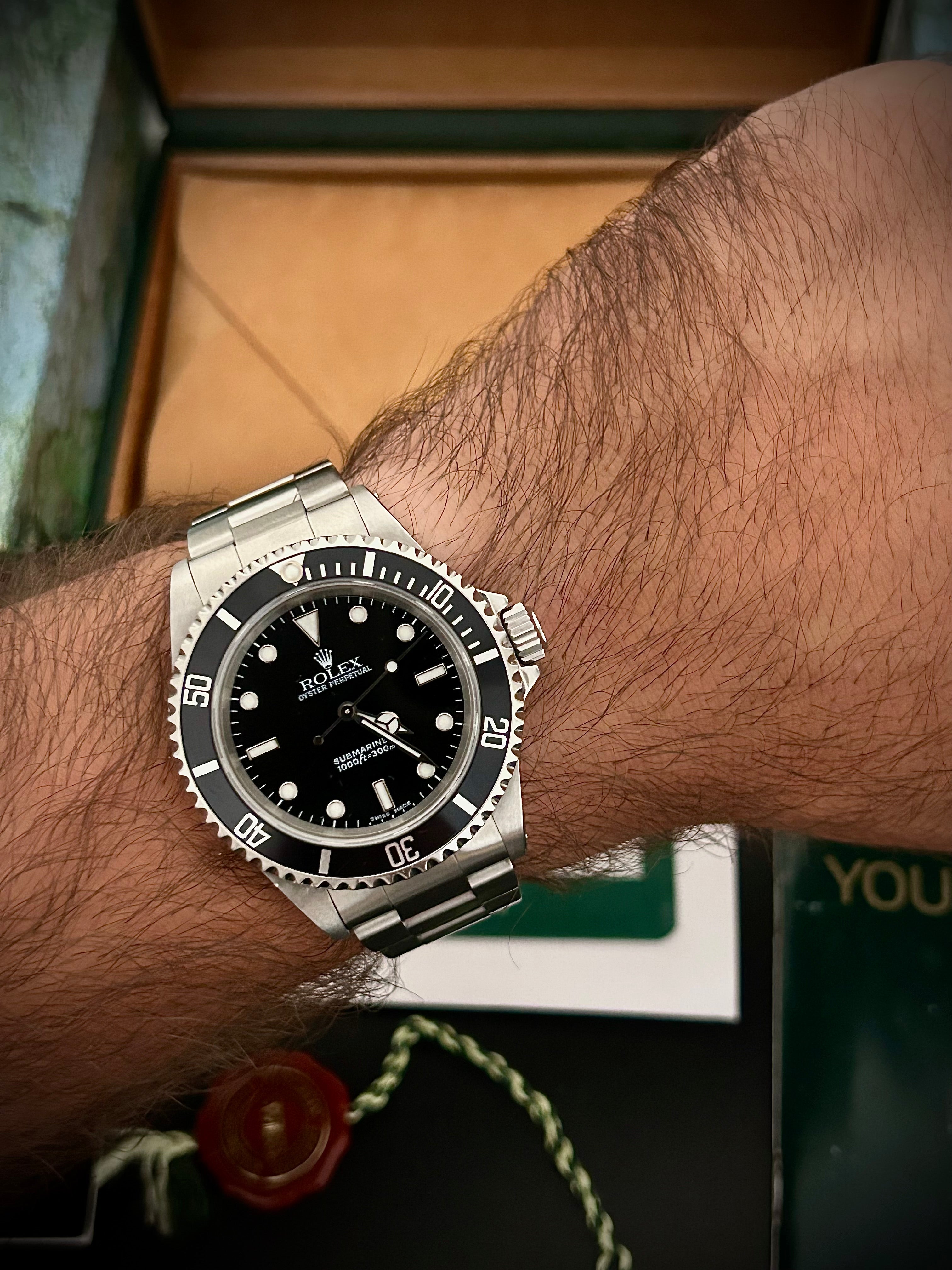 2001 ROLEX SUBMARINER TWO-LINER 14060M, RSC SERVICE, INC GST