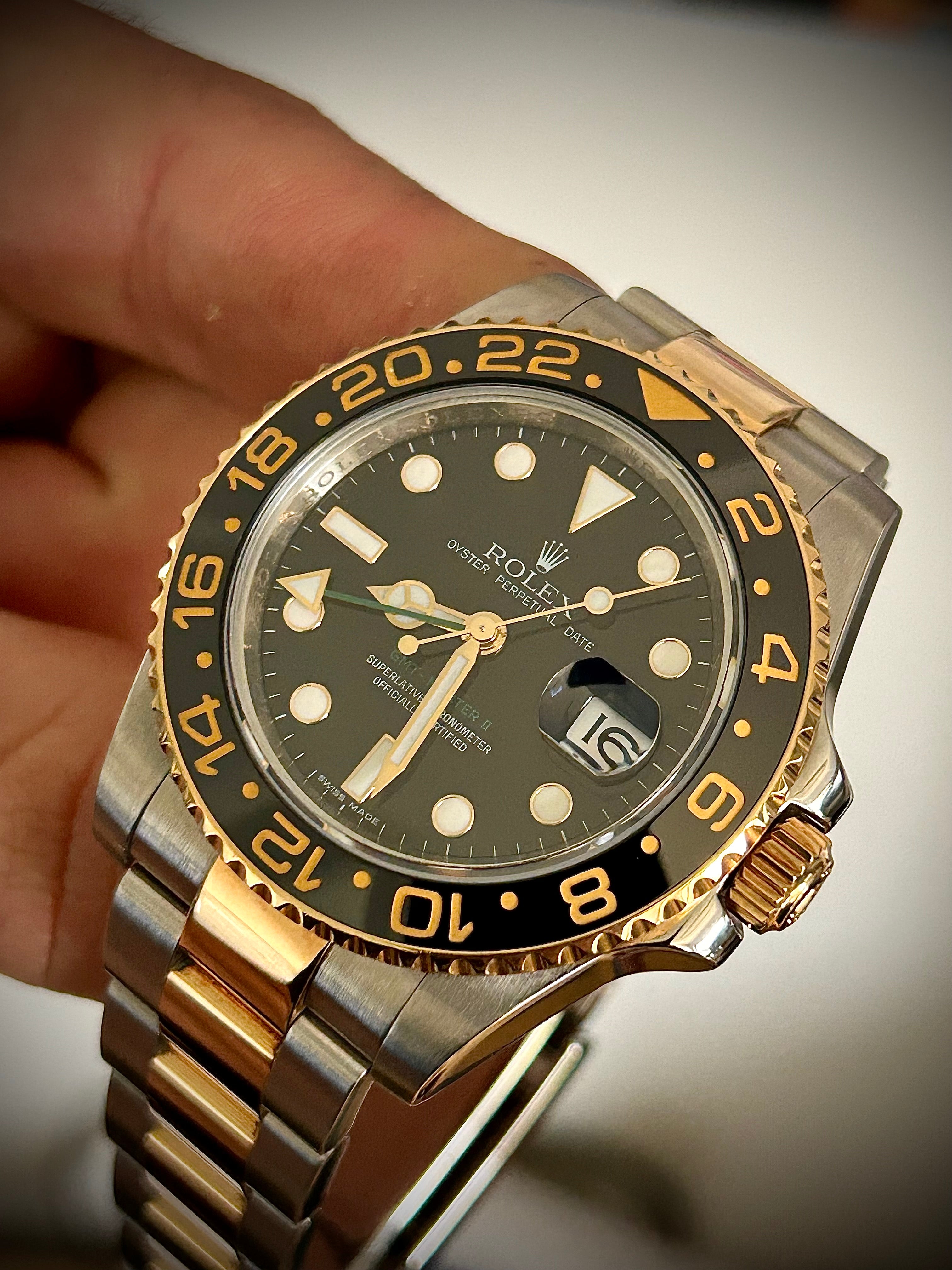 2009 ROLEX GMT MASTER II, 116713LN, BOX AND PAPERS, INC GST