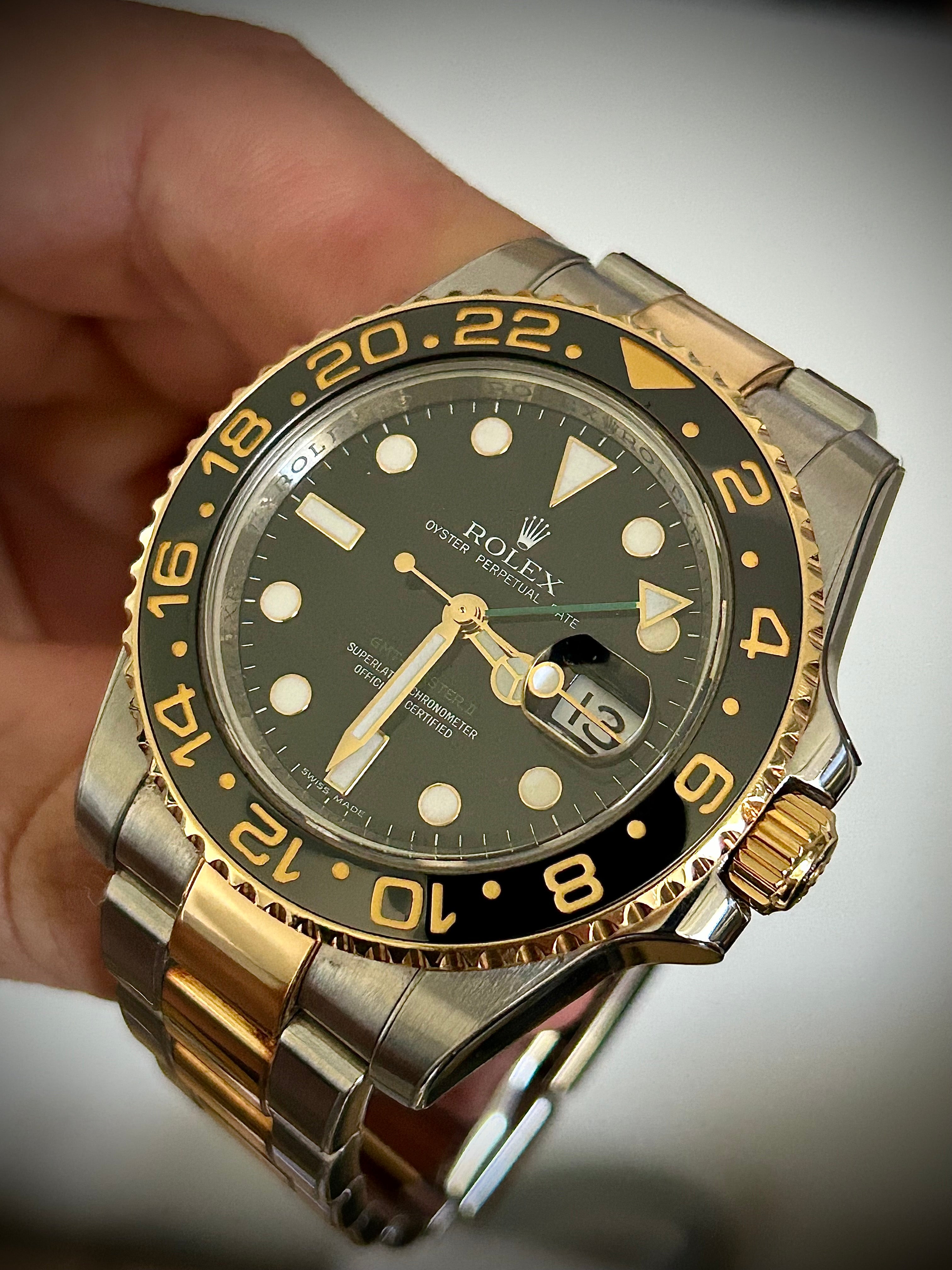 2006 ROLEX GMT MASTER II, 116713LN, BOX AND PAPERS, INC GST
