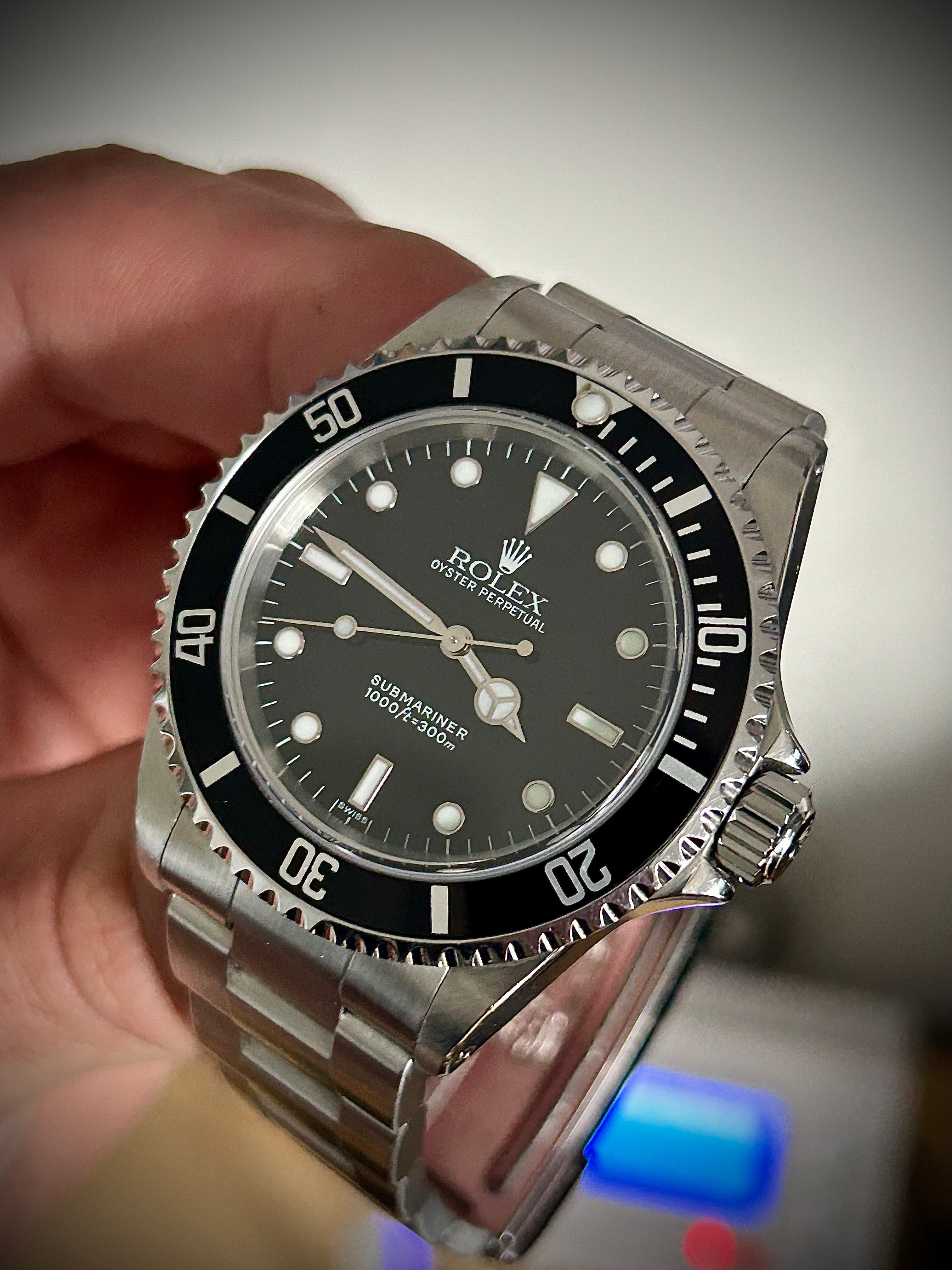 1999 ROLEX SUBMARINER NO-DATE, TWO LINER, SWISS ONLY, 14060, BOX AND PAPERS WITH RSC, INC GST