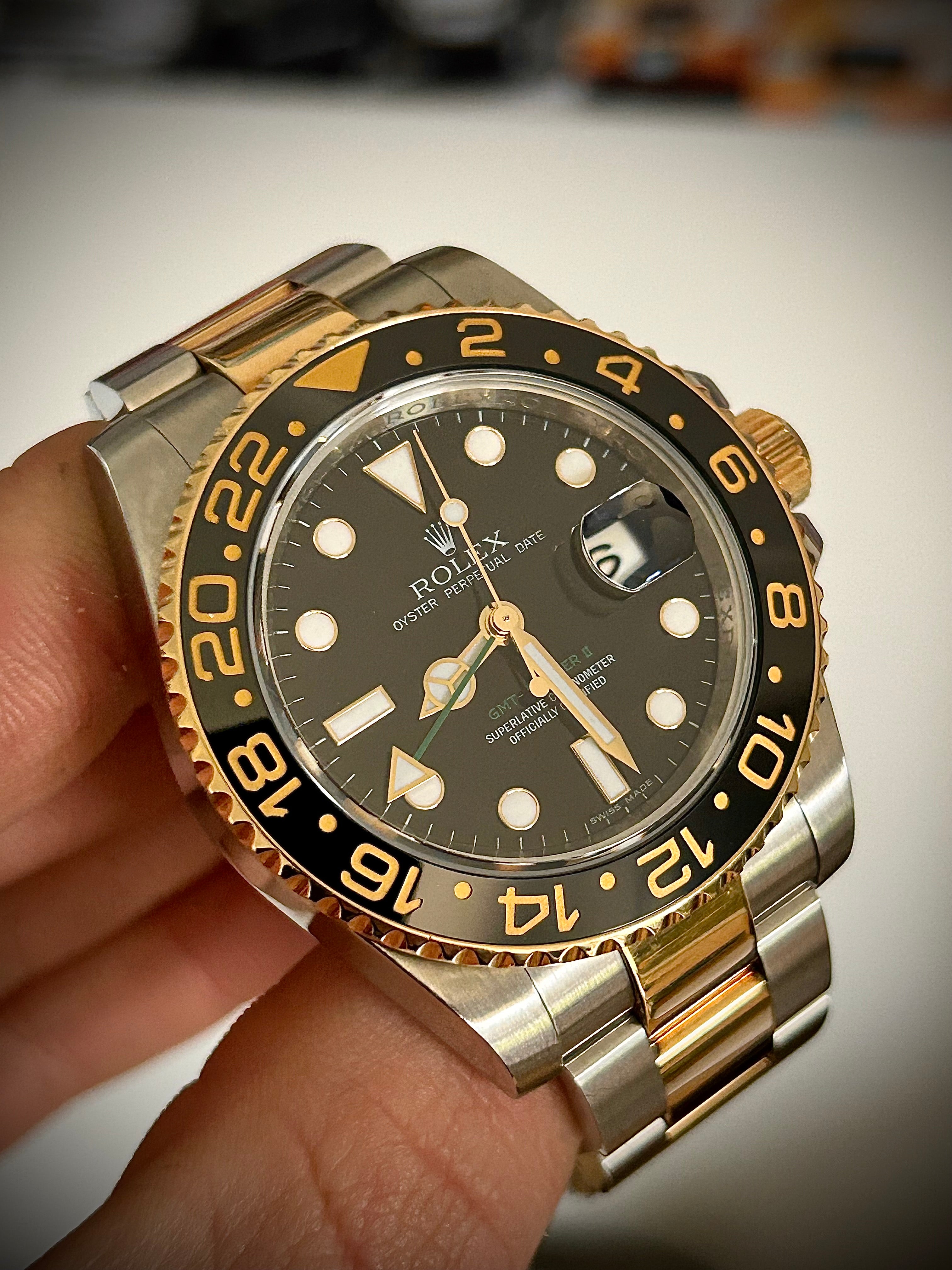2009 ROLEX GMT MASTER II, 116713LN, BOX AND PAPERS, INC GST