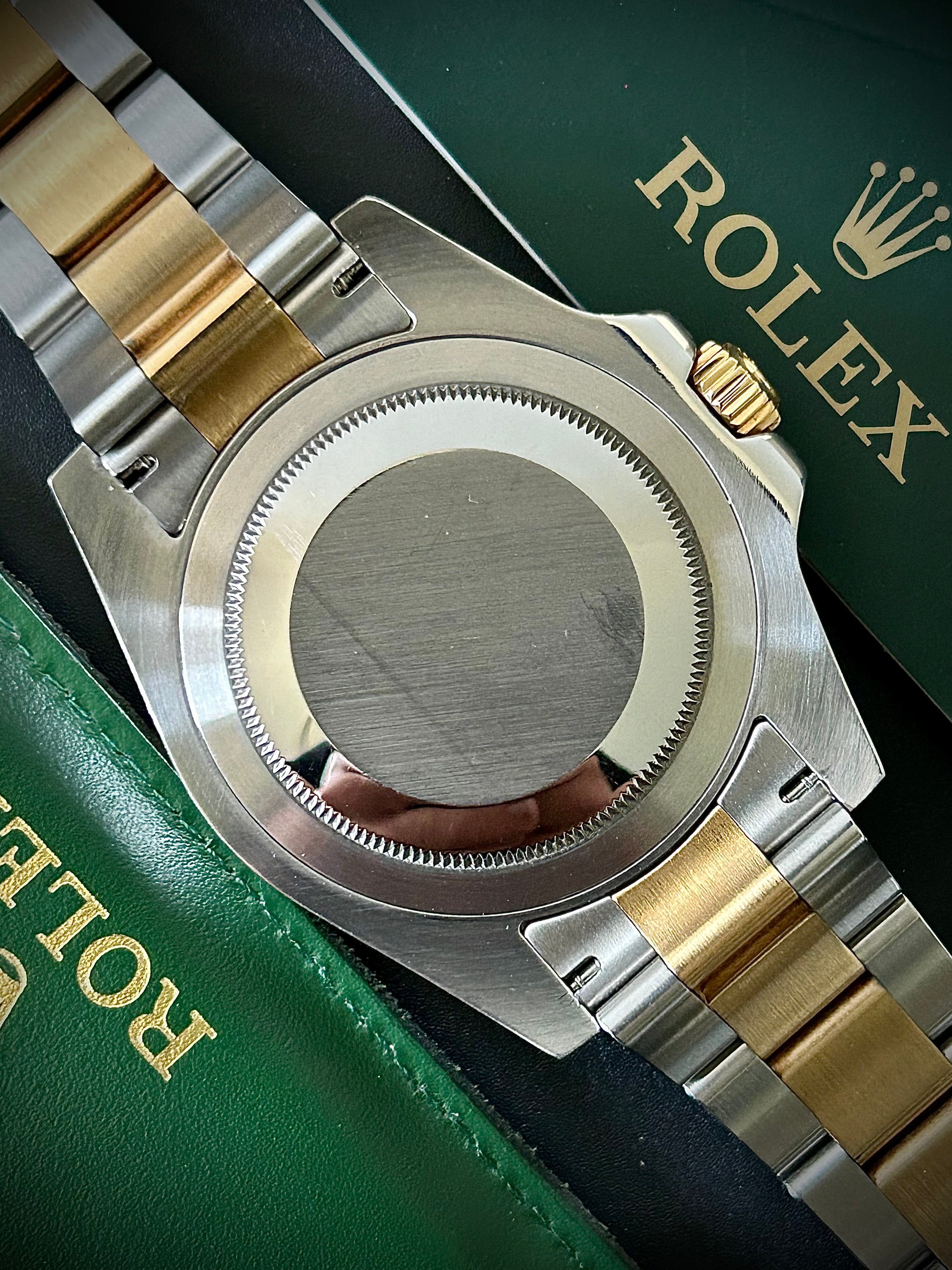 2009 ROLEX GMT MASTER II, 116713LN, BOX AND PAPERS, INC GST