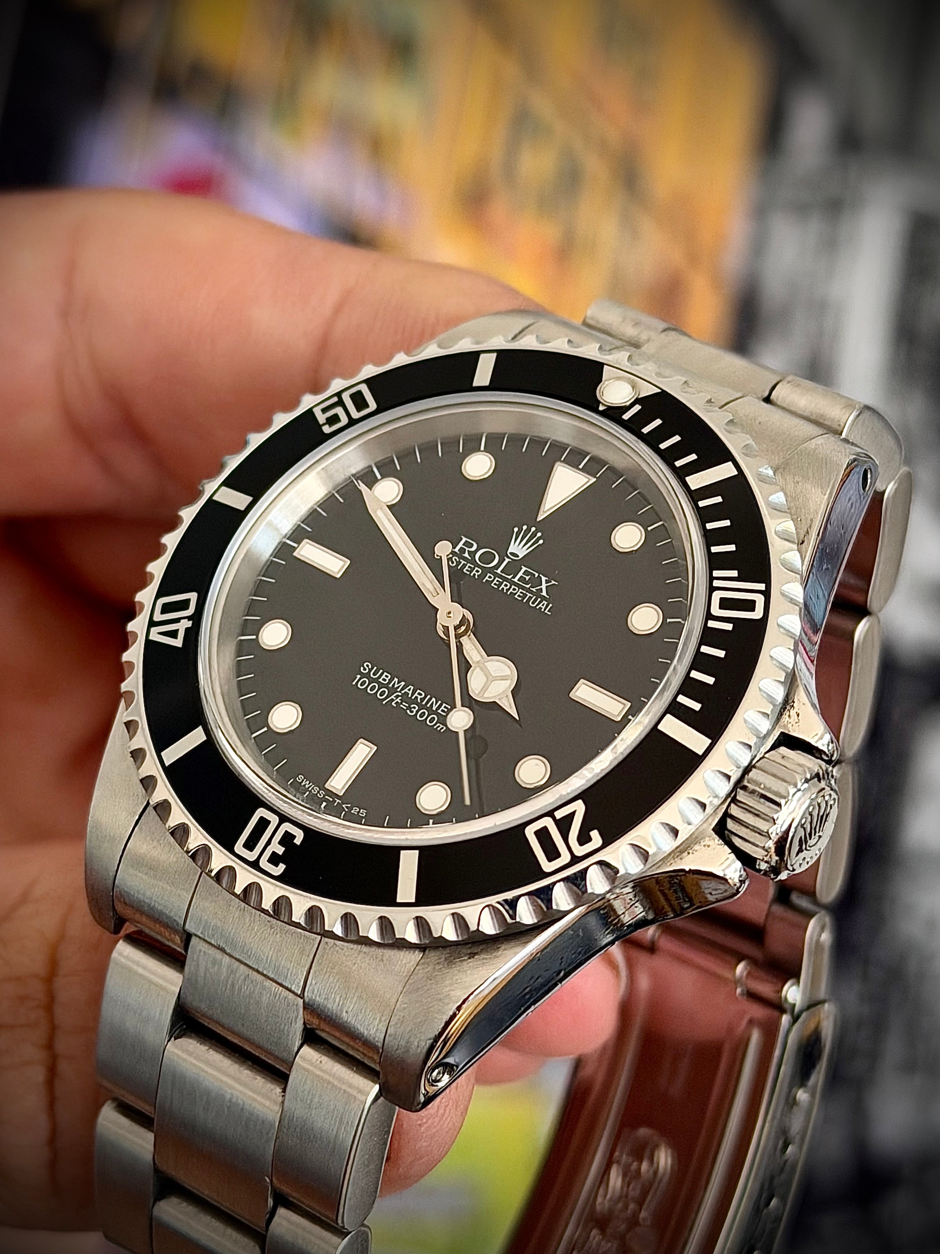 1997 ROLEX SUBMARINER NO-DATE, TWO LINER, 14060, BOX AND PAPERS, INC GST