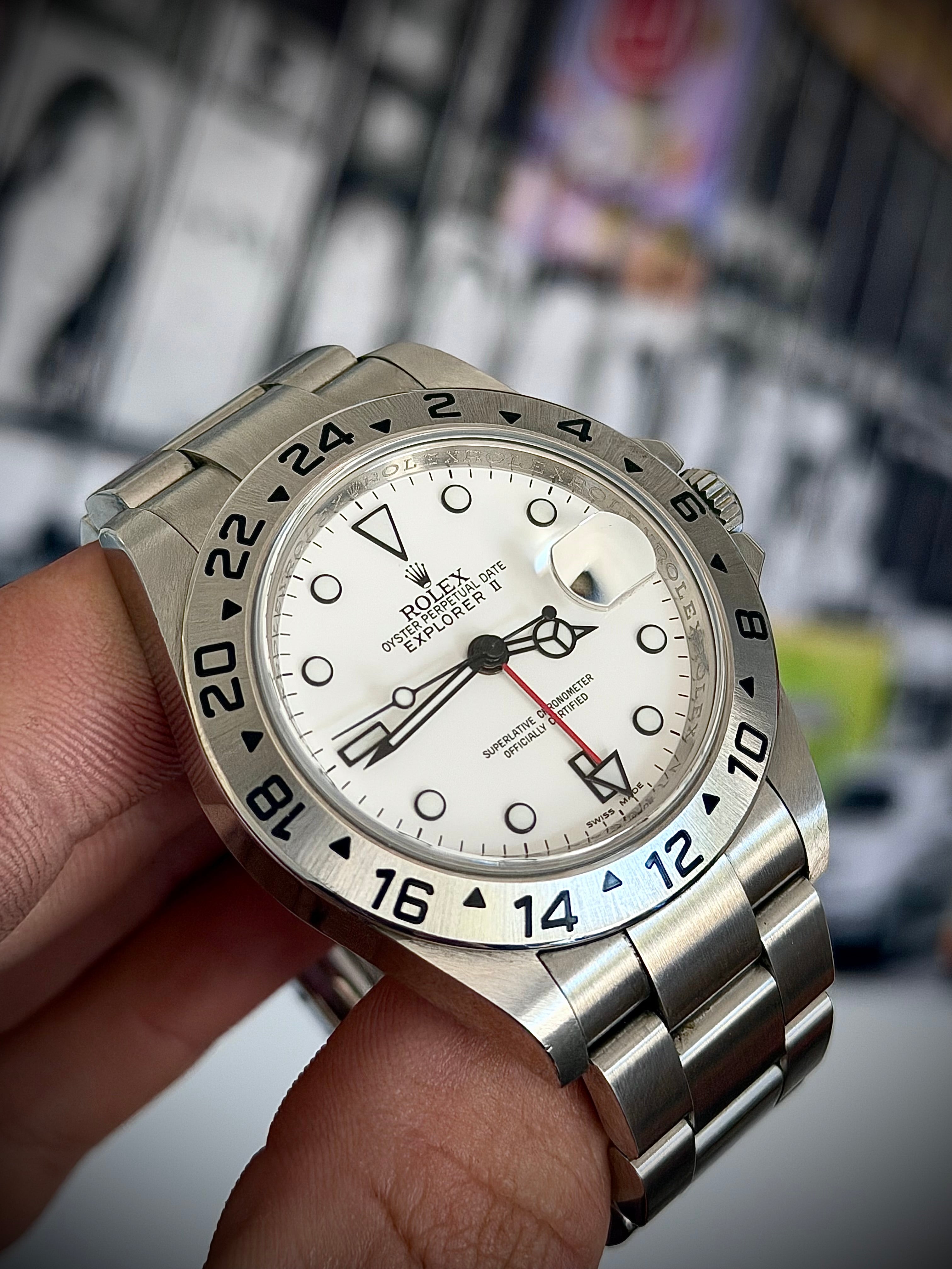 2011 ROLEX EXPLORER II, POLAR” 16570, NO HOLES SEL, ENGRAVED REHAUT, 3186 MOVEMENT, BOX BOOKLETS AND ORIGINAL RECEIPT, INC GST