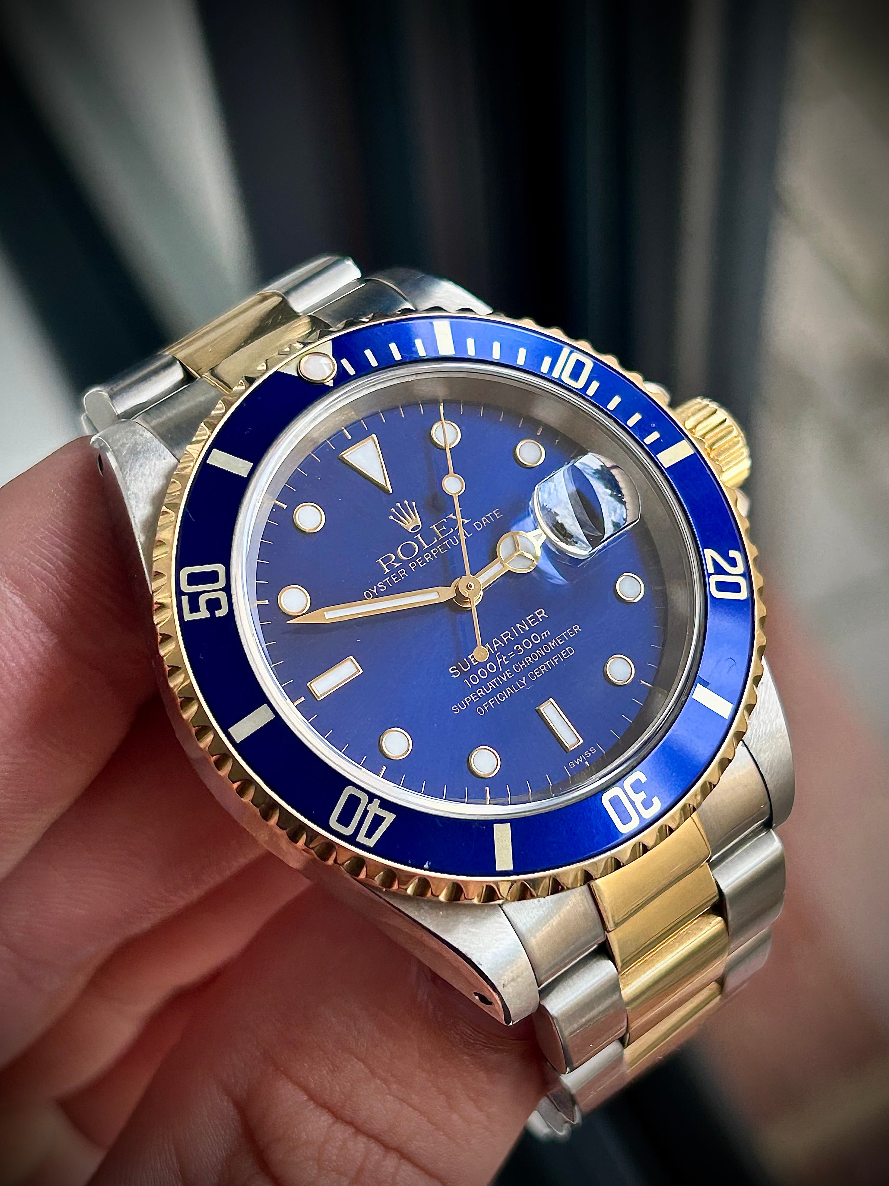 1999 ROLEX SUBMARINER DATE “BLUESY”, SWISS ONLY, FULL SET, INC GST