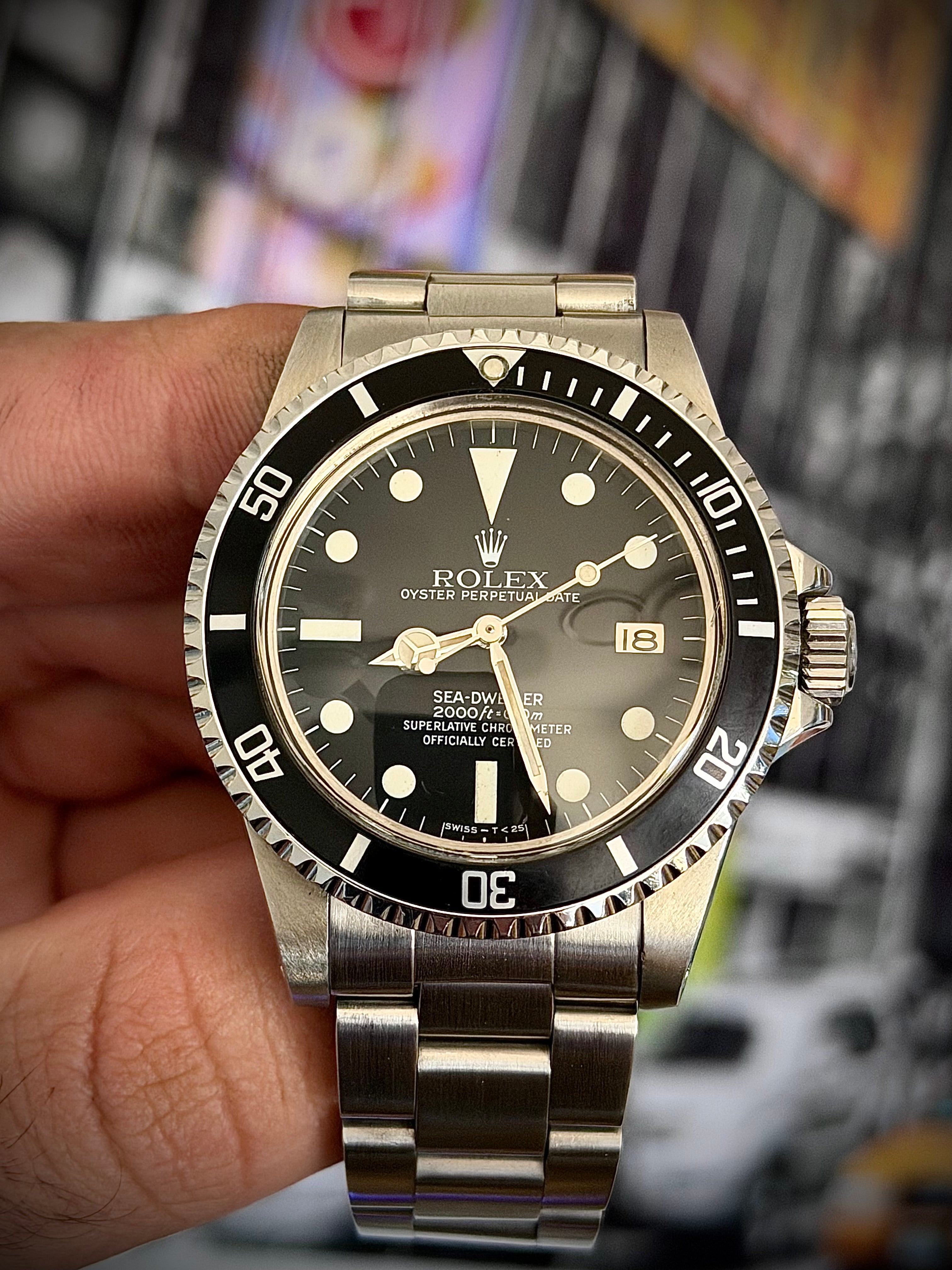1981 ROLEX SEA-DWELLER 1665 “GREAT WHITE”, BOX AND PAPERS, INC GST