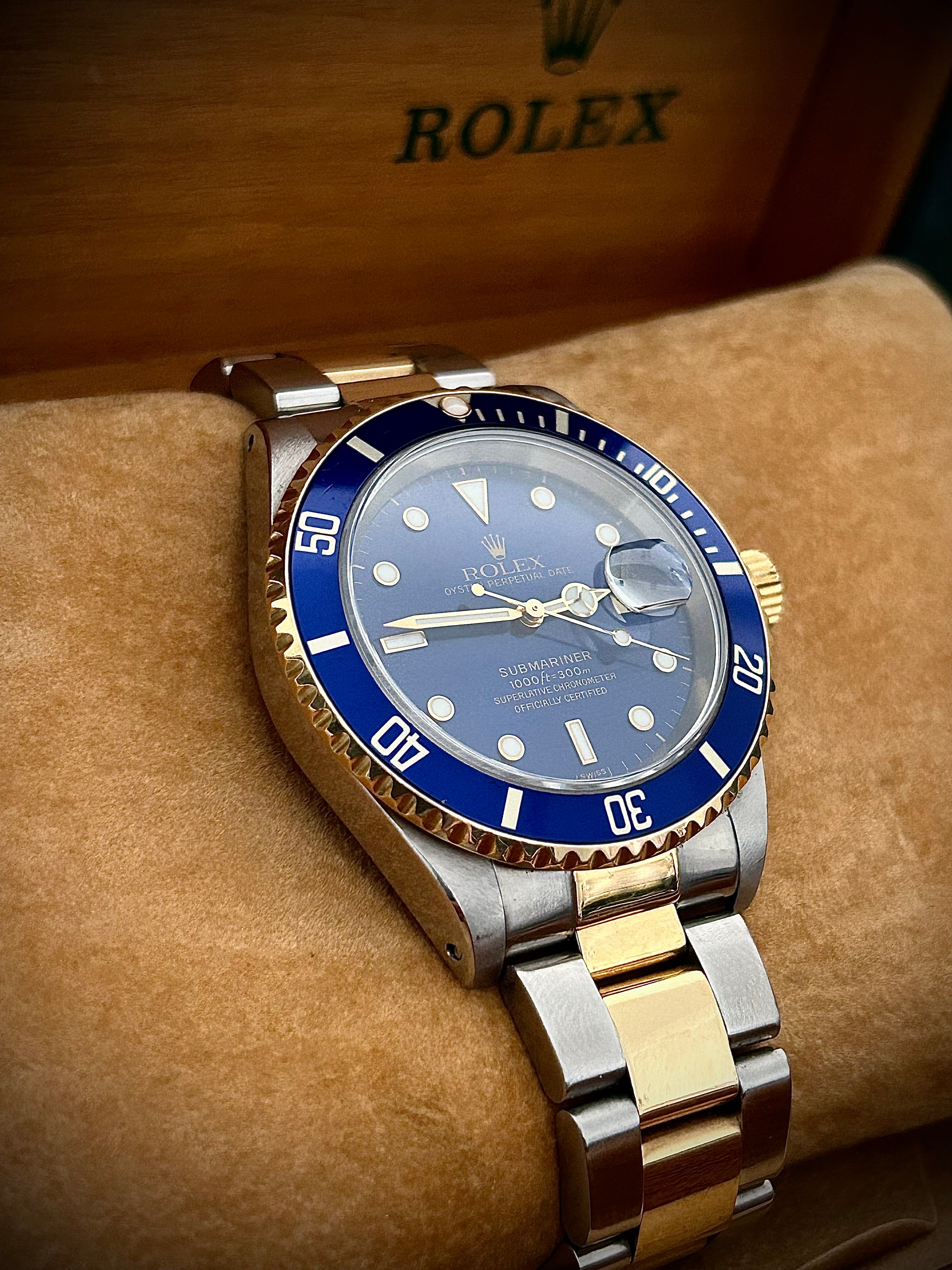 1999 ROLEX SUBMARINER DATE “BLUESY”, SWISS ONLY, FULL SET, INC GST